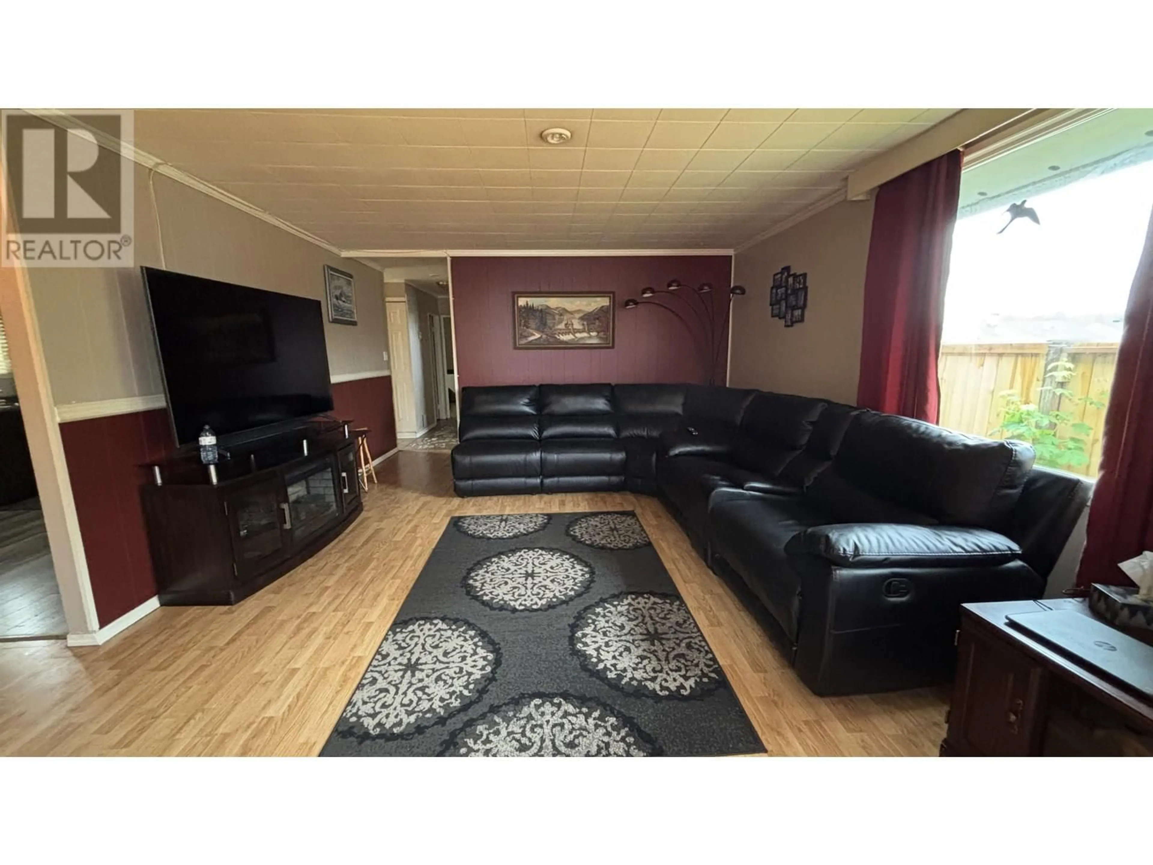 Living room with furniture, wood/laminate floor for 93 CAPILANO STREET, Kitimat British Columbia V8C2J6