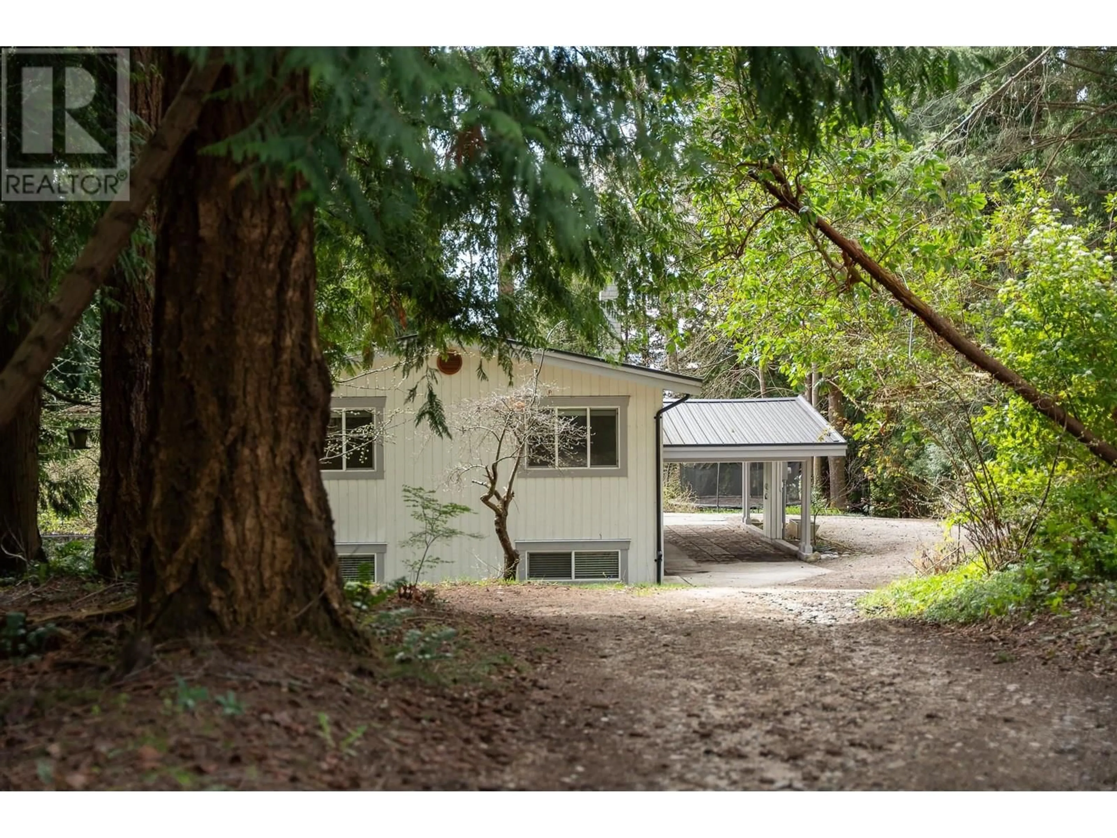 A pic from outside/outdoor area/front of a property/back of a property/a pic from drone, forest/trees view for 5080 SUNSHINE COAST HIGHWAY, Sechelt British Columbia V7Z0G6