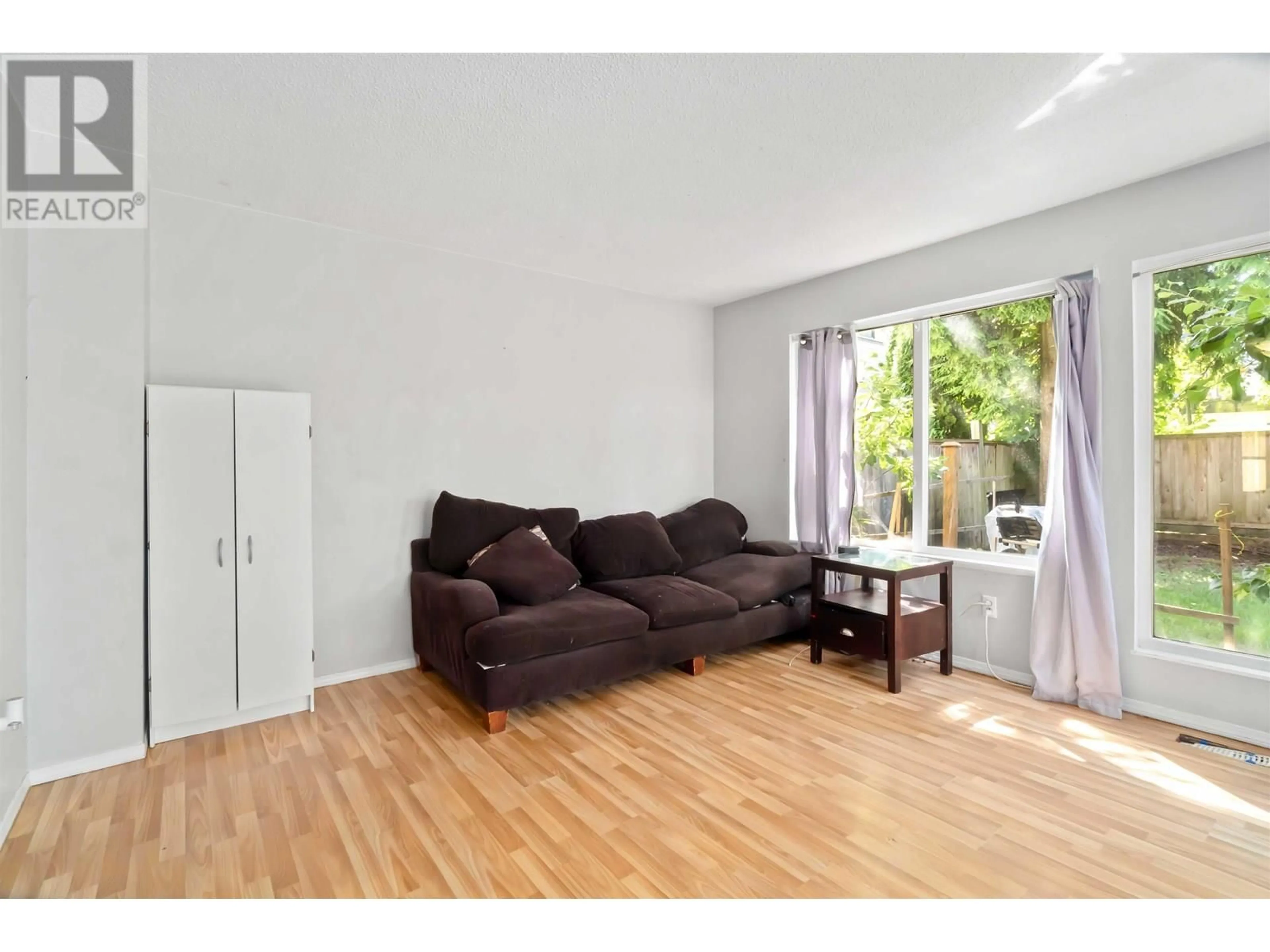 Living room with furniture, wood/laminate floor for 881 PINEBROOK PLACE, Coquitlam British Columbia V3C4C1