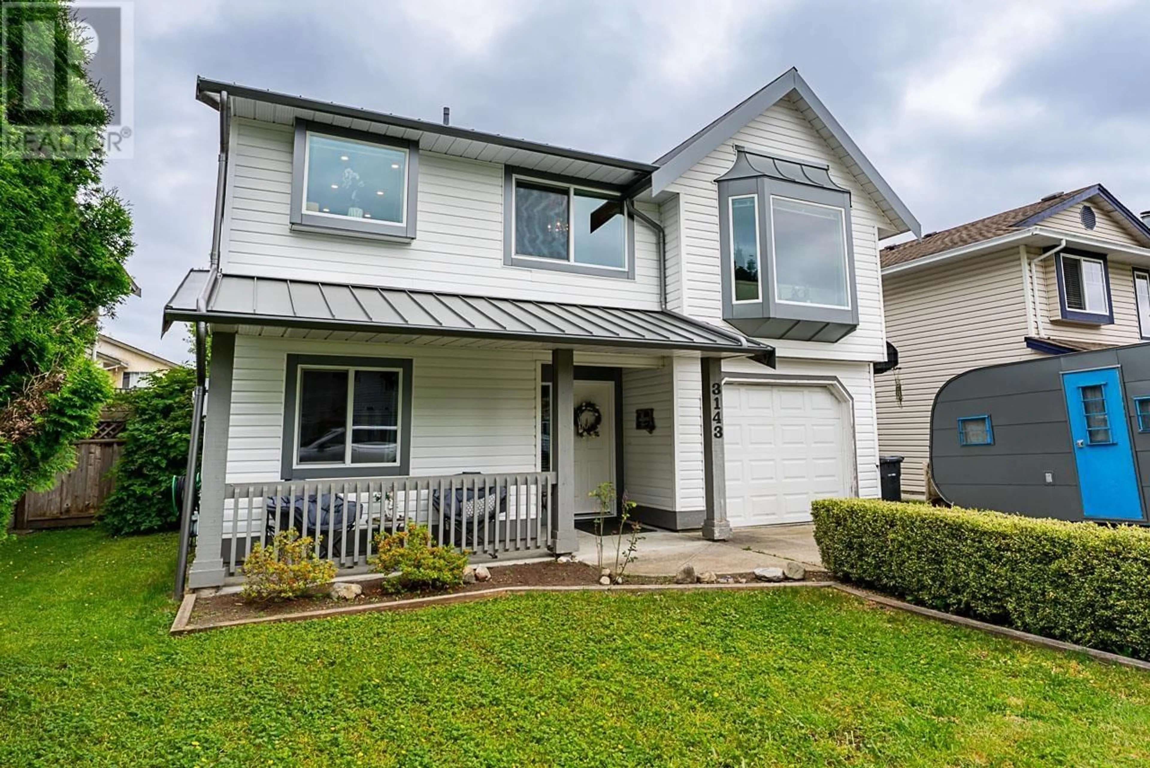 Home with vinyl exterior material, street for 3143 RAE STREET, Port Coquitlam British Columbia V3B2Y3