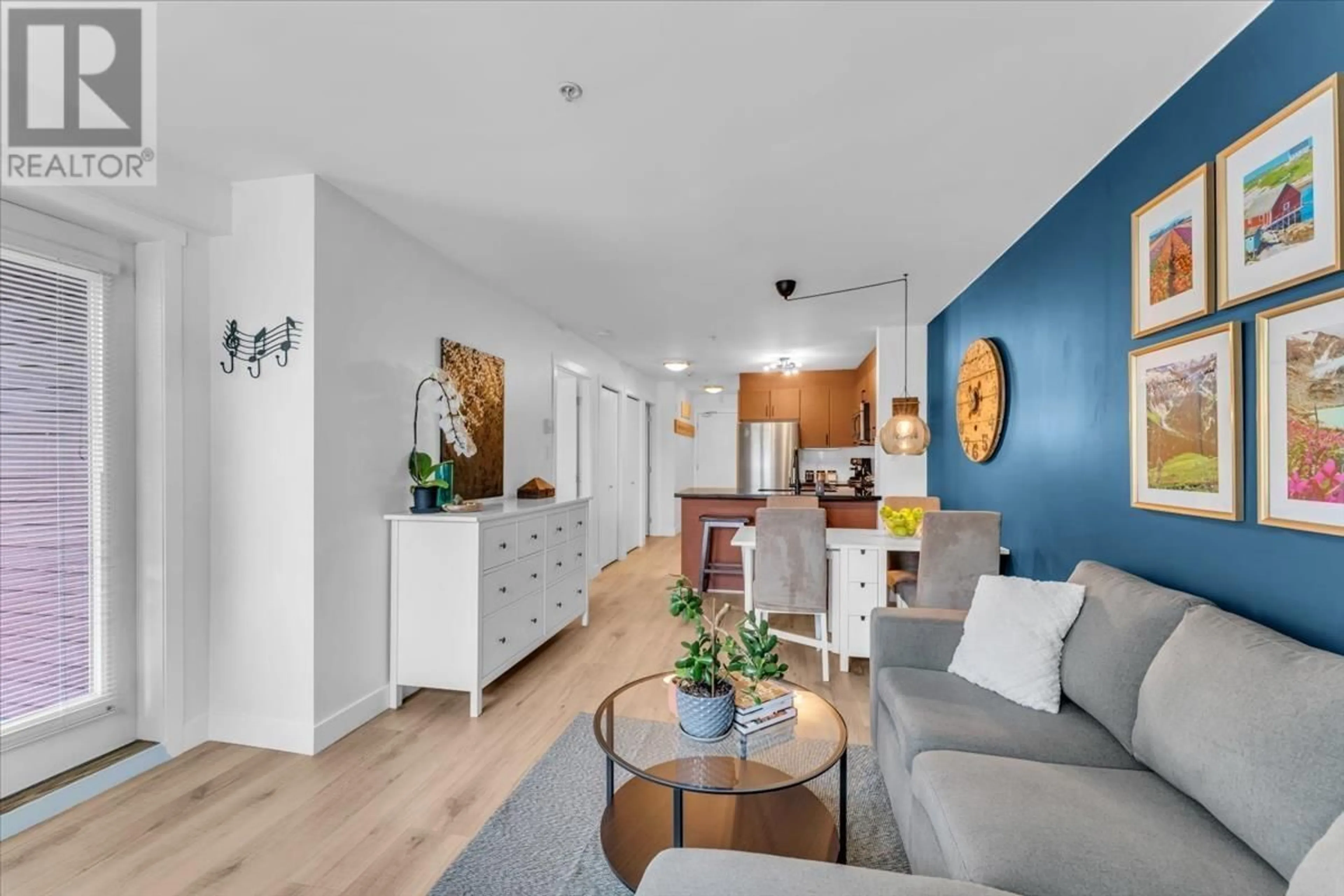 Living room with furniture, wood/laminate floor for 305 - 930 16TH AVENUE, Vancouver British Columbia V5Z1T2