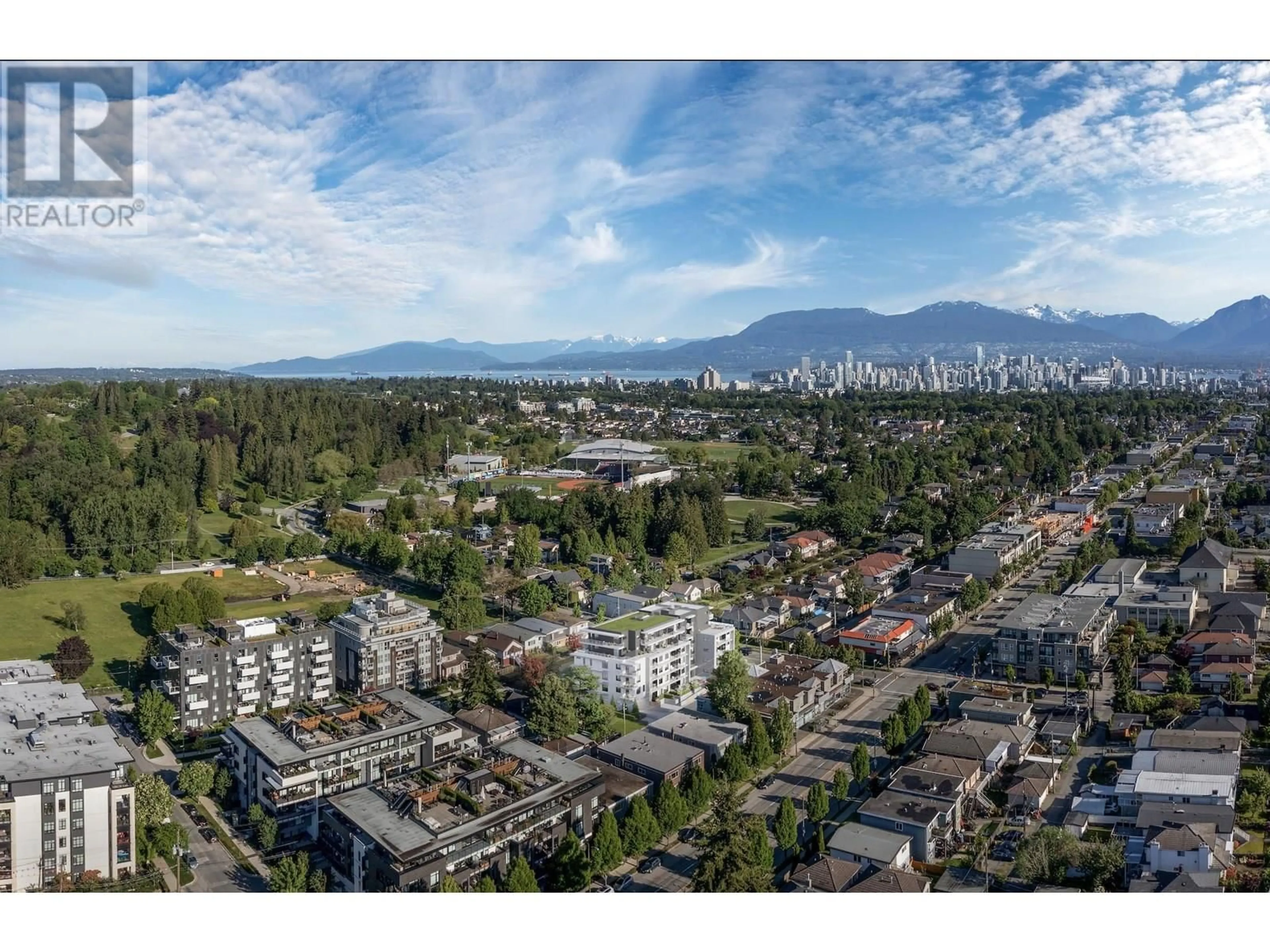 A pic from outside/outdoor area/front of a property/back of a property/a pic from drone, mountain view for 212 - 4928 QUEBEC STREET, Vancouver British Columbia V5W2N2
