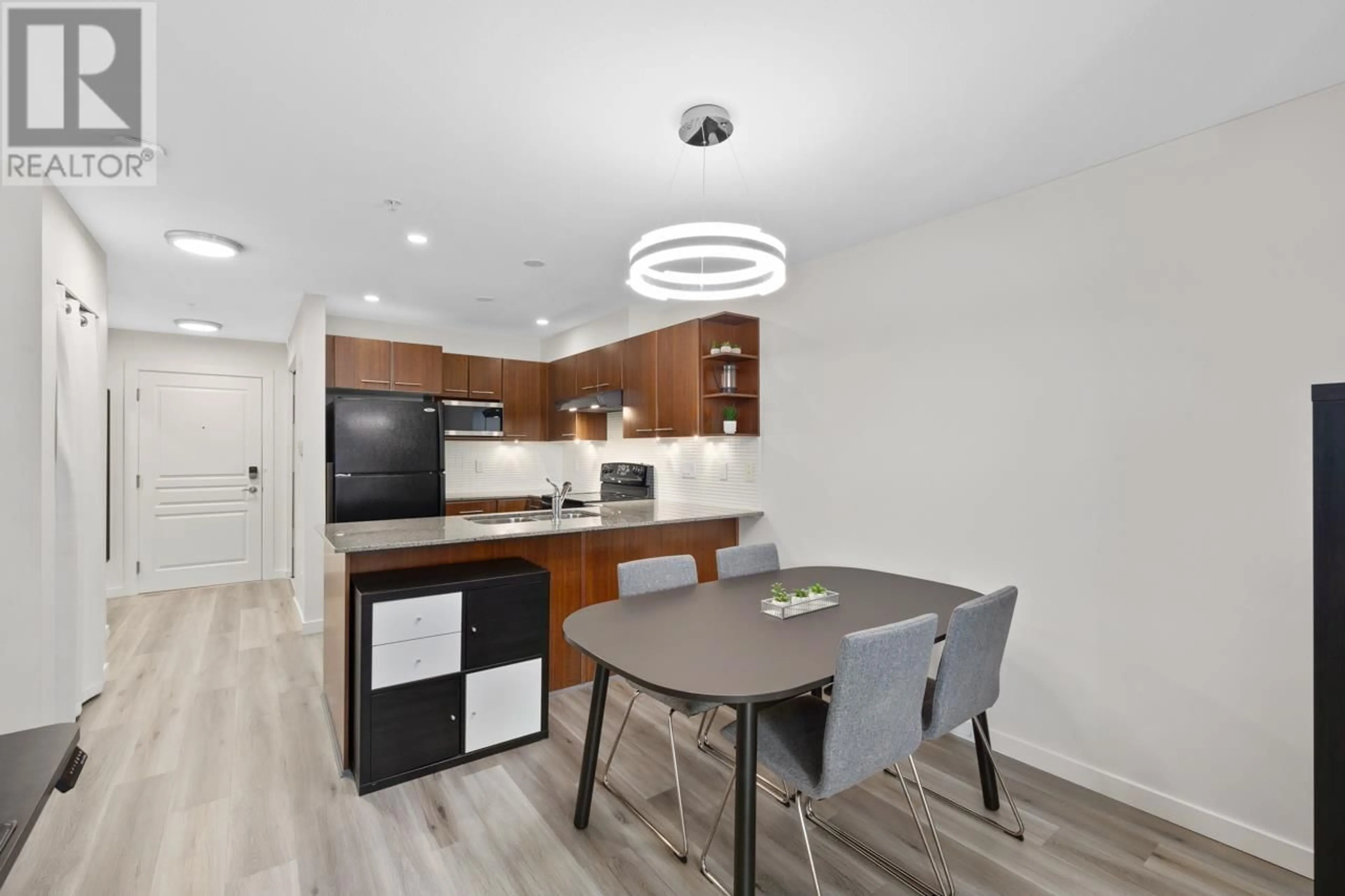 Open concept kitchen, wood/laminate floor for 116 - 4868 BRENTWOOD DRIVE, Burnaby British Columbia V5C0C2