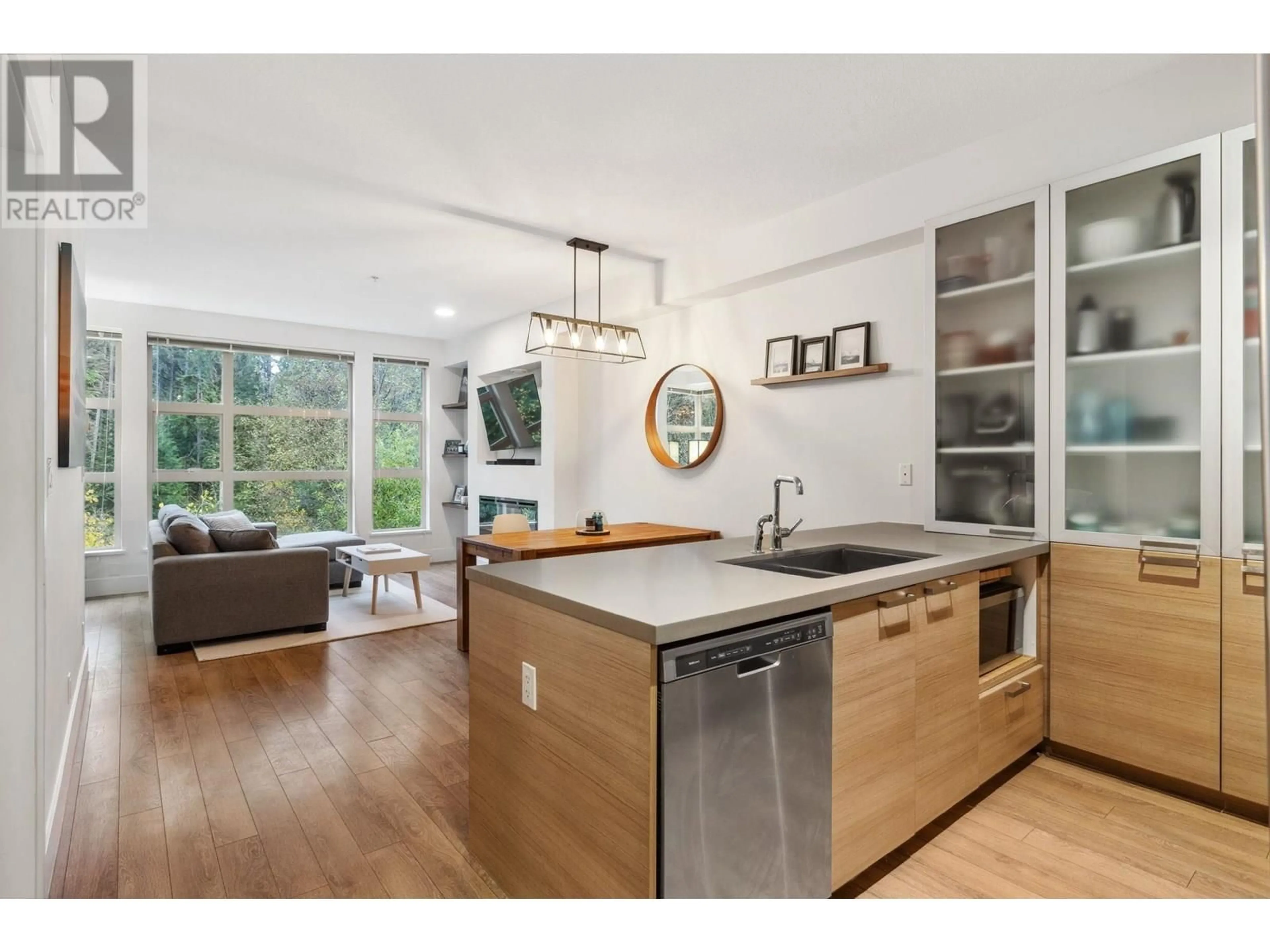 Open concept kitchen, wood/laminate floor for 422 - 3606 ALDERCREST DRIVE, North Vancouver British Columbia V7G0A3