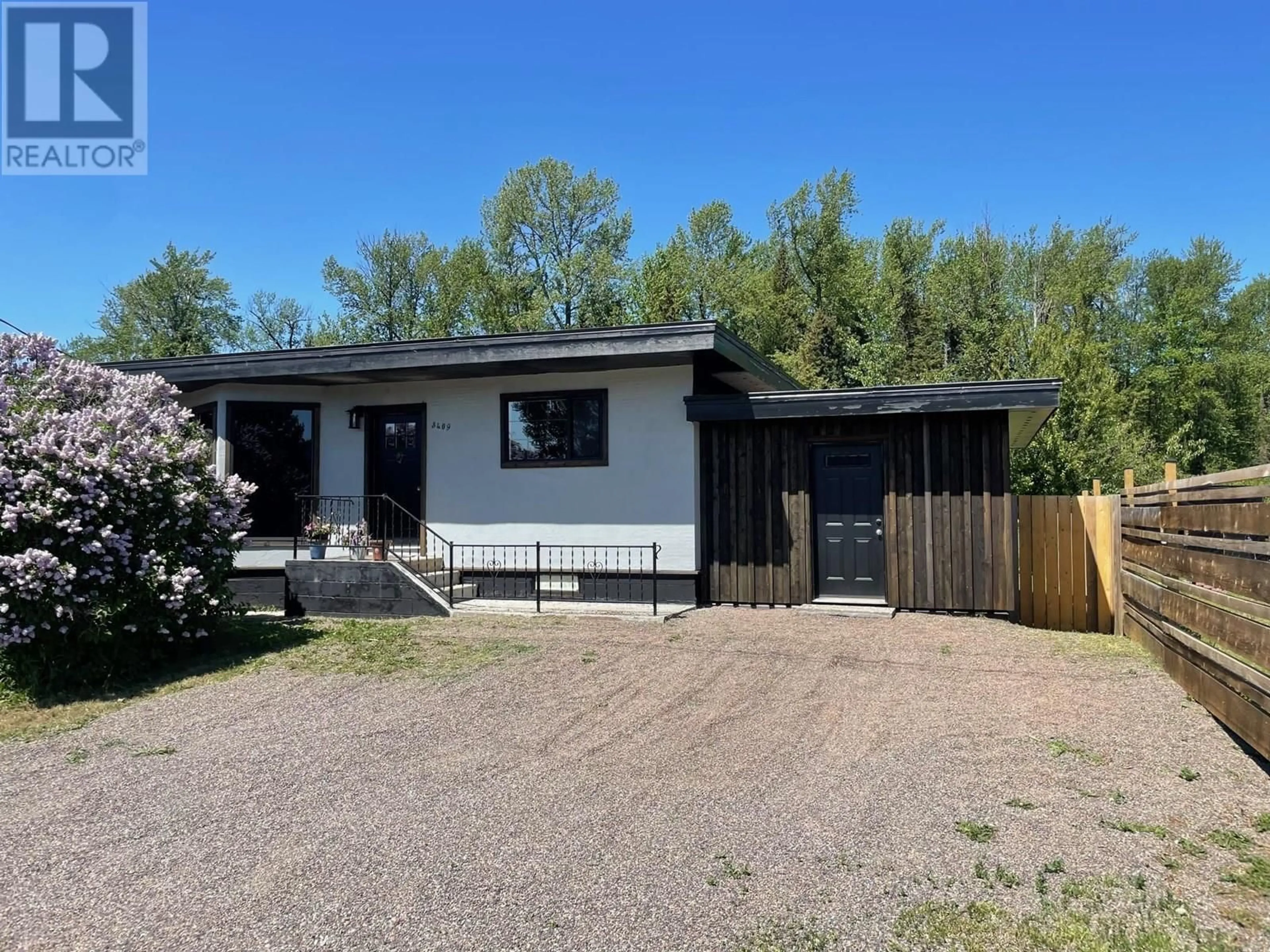 Home with vinyl exterior material, street for 3409 6TH STREET, Houston British Columbia V0J1Z0
