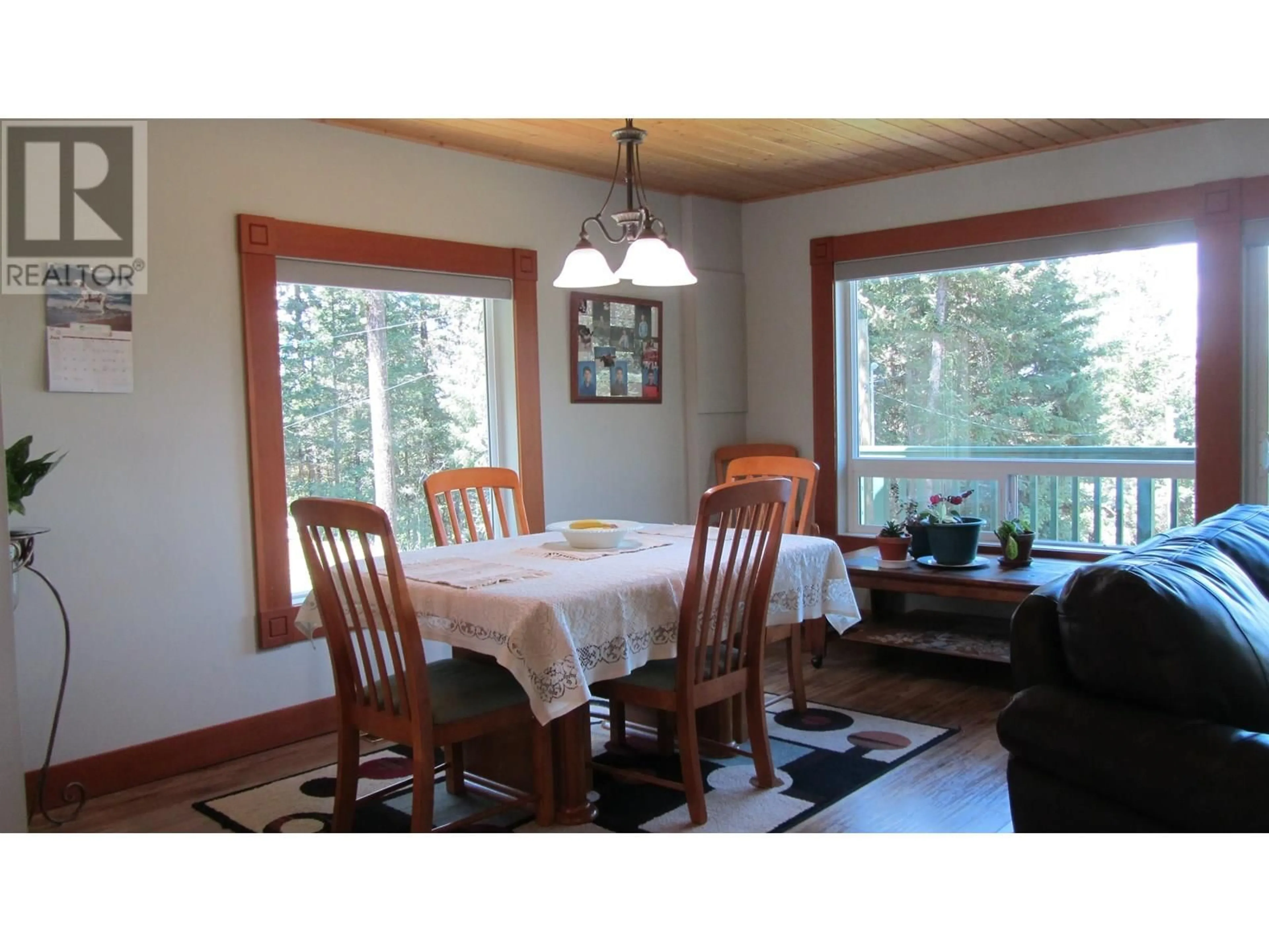 Dining room, wood/laminate floor for 5258 MACKAY CRESCENT, 108 Mile Ranch British Columbia V0K2Z0