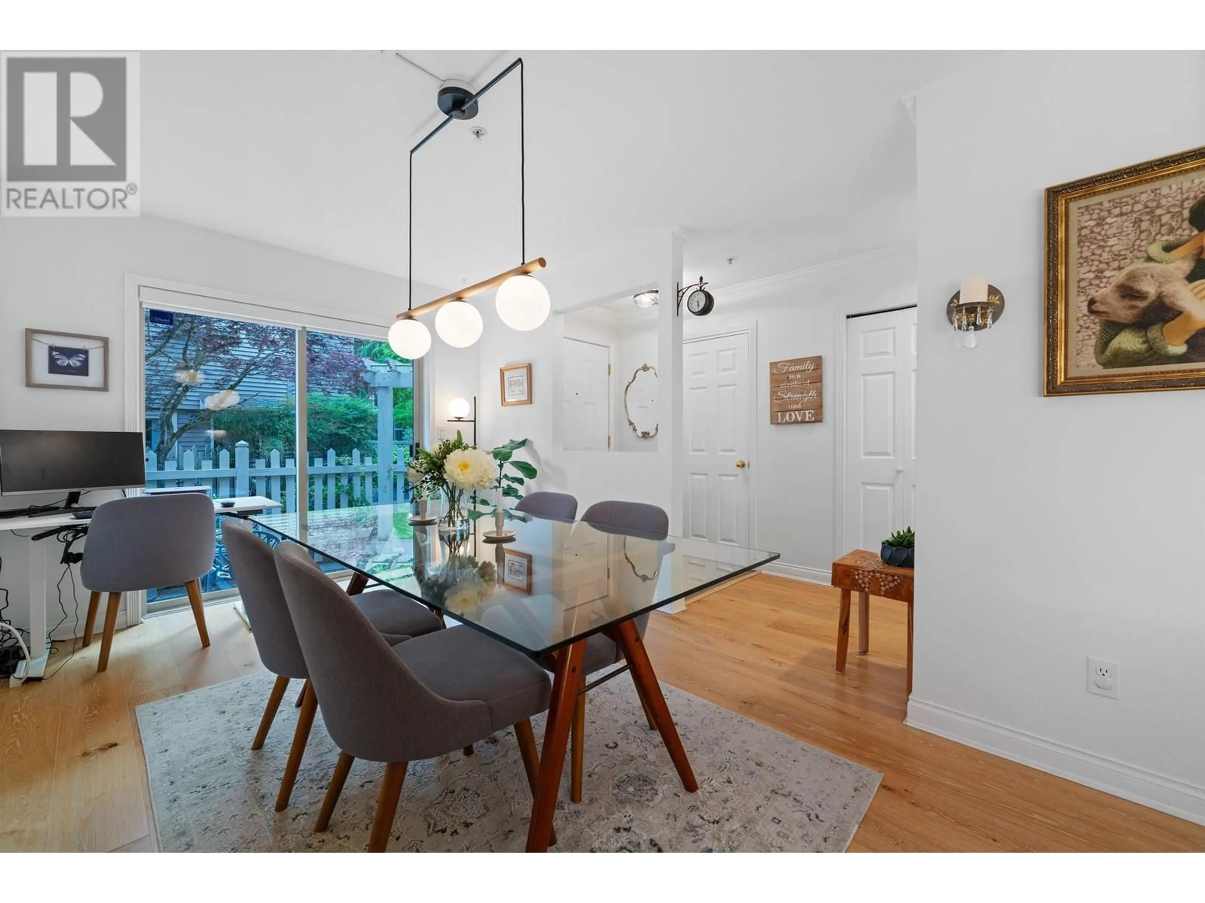 Dining room, wood/laminate floor for 10 - 222 5TH STREET, North Vancouver British Columbia V7L1L7