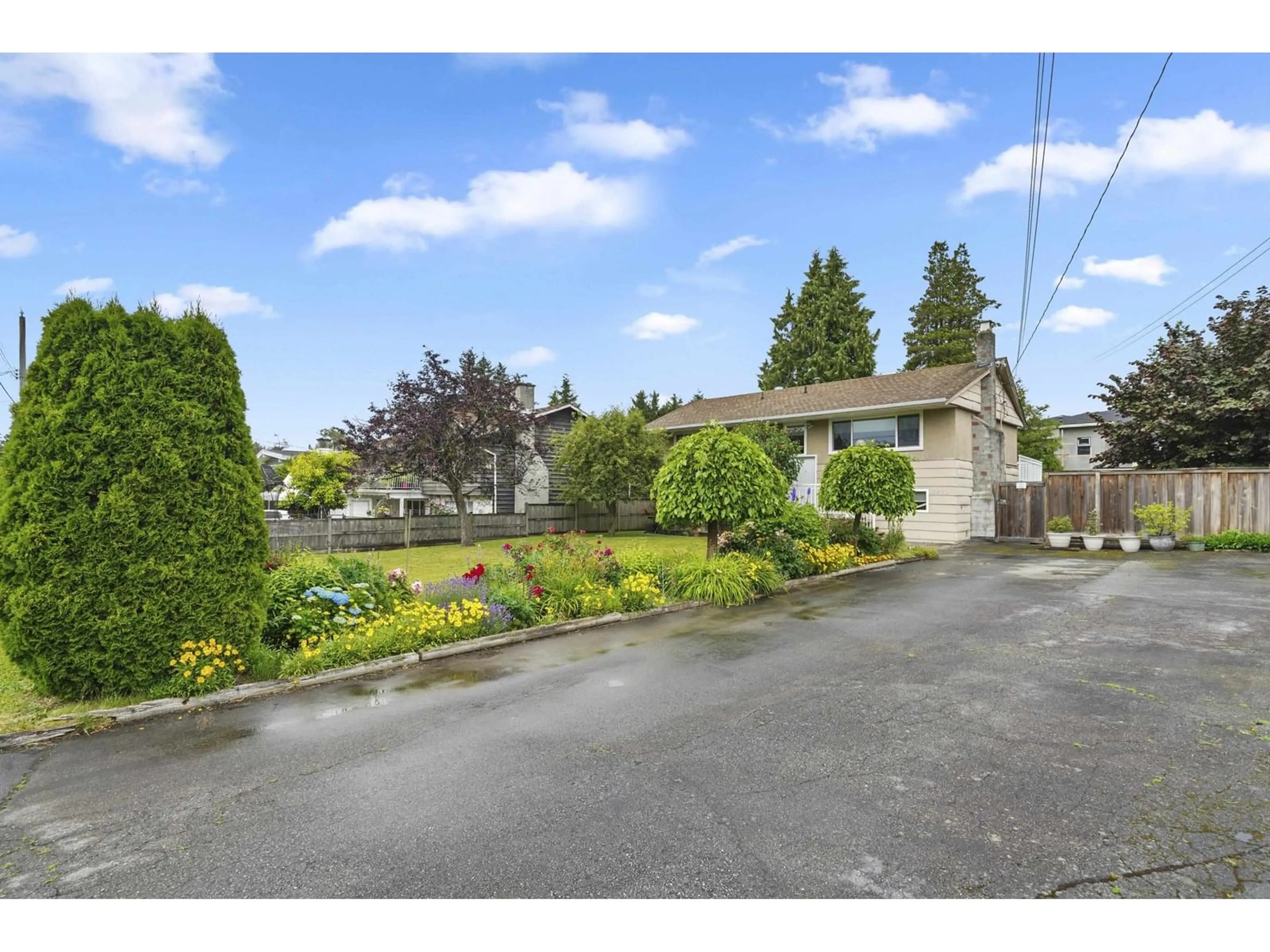 A pic from outside/outdoor area/front of a property/back of a property/a pic from drone, street for 10930 141 A, Surrey British Columbia V3R3J9