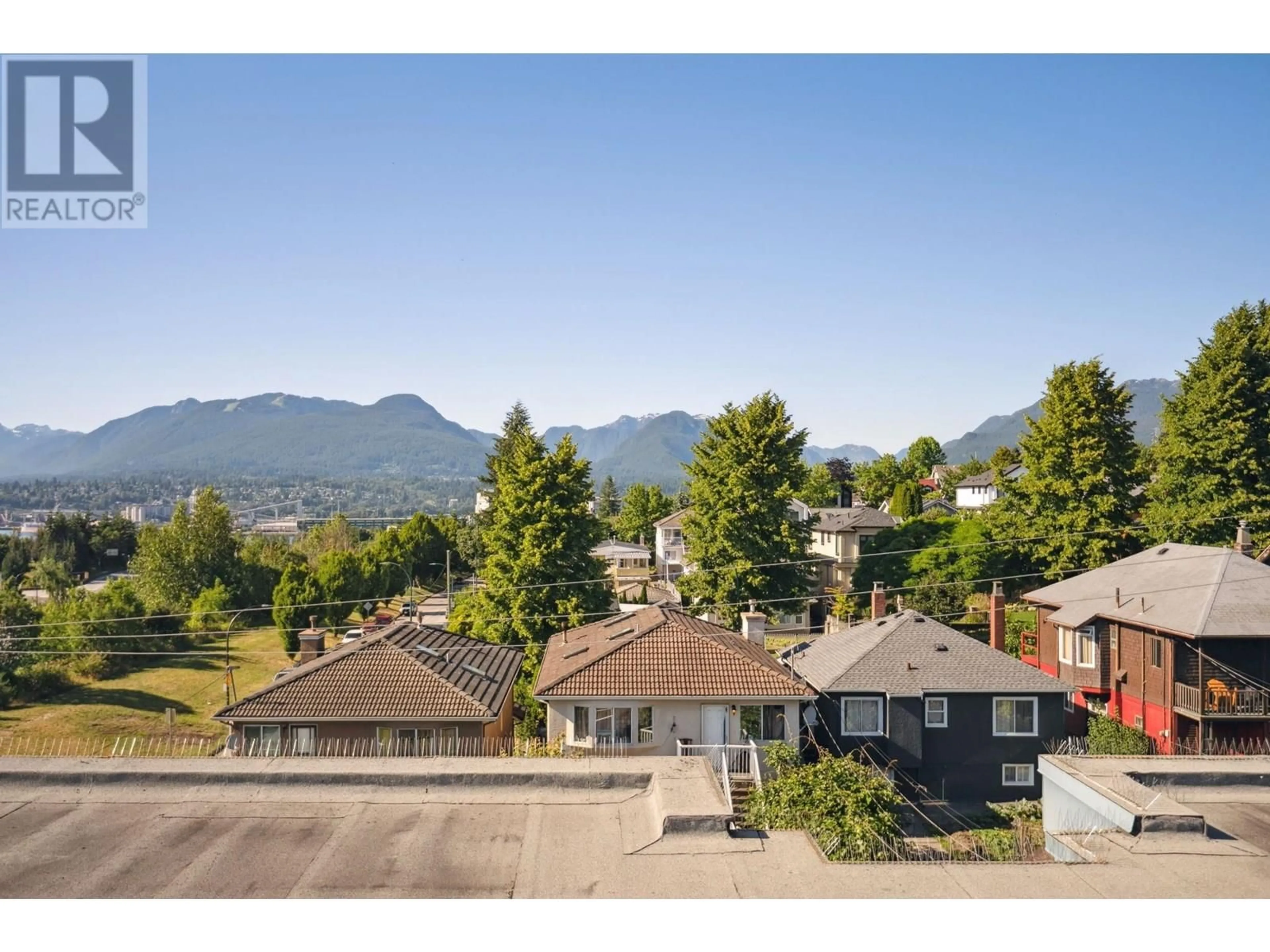 A pic from outside/outdoor area/front of a property/back of a property/a pic from drone, mountain view for 312 - 3423 HASTINGS STREET, Vancouver British Columbia V5K2A5