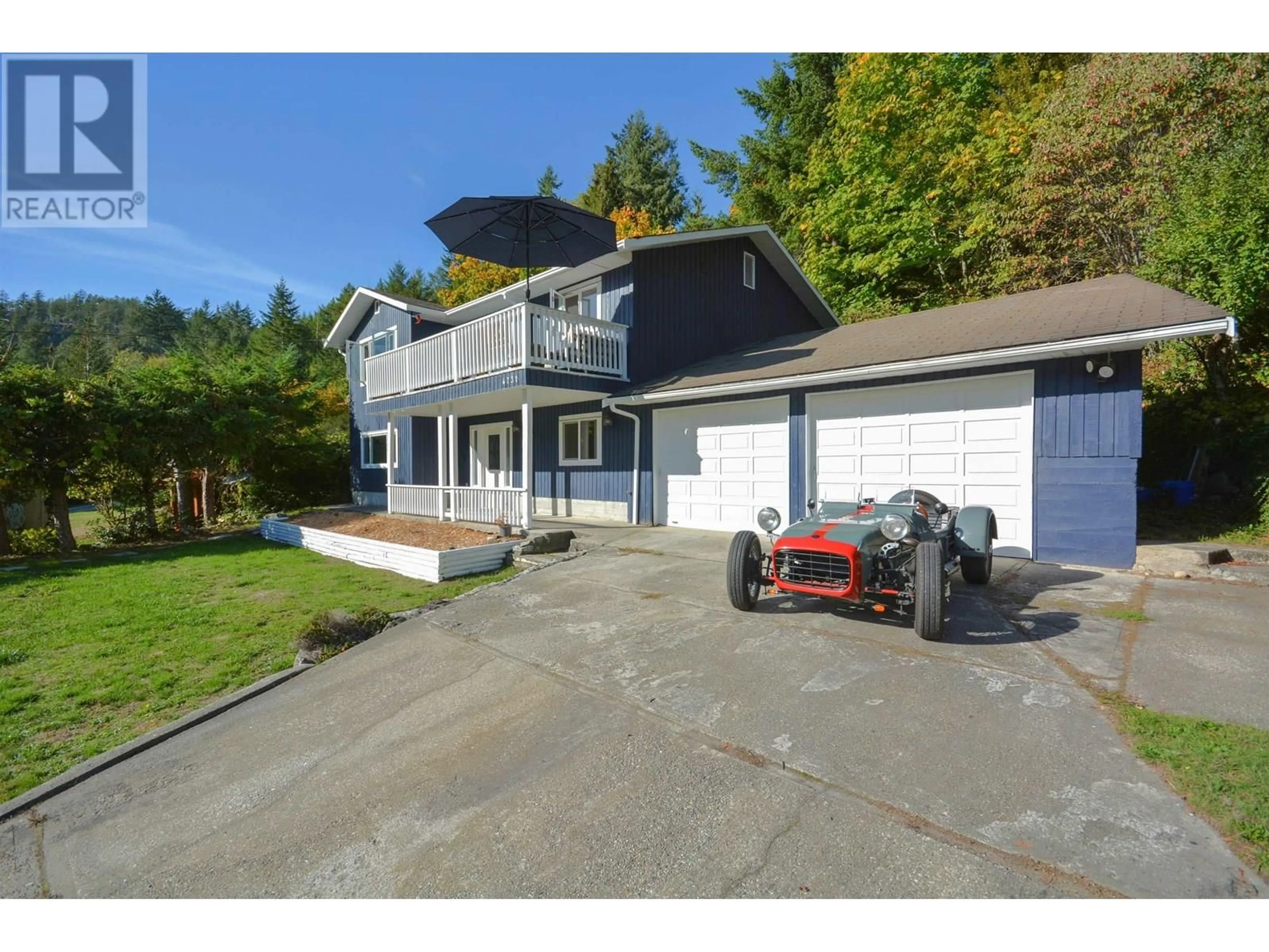 A pic from outside/outdoor area/front of a property/back of a property/a pic from drone, street for 4731 SINCLAIR BAY ROAD, Pender Harbour British Columbia V0N1S1
