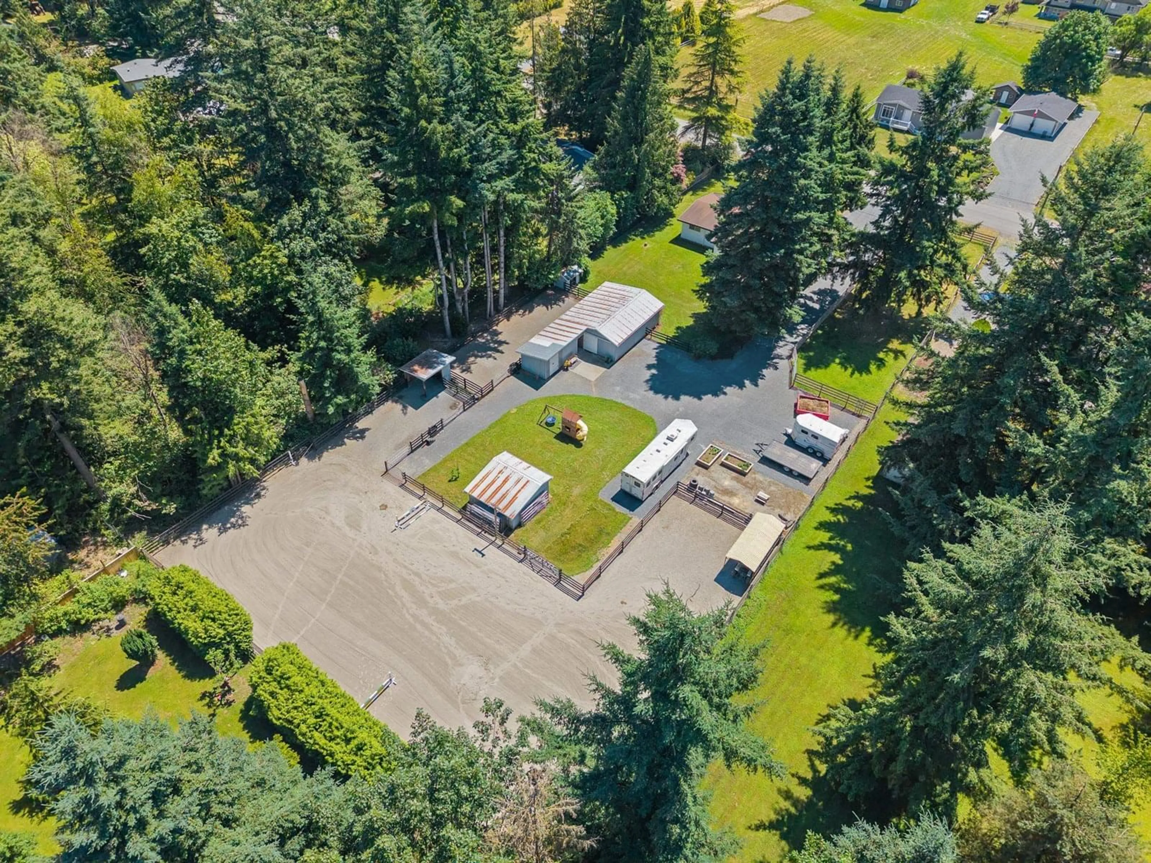 A pic from outside/outdoor area/front of a property/back of a property/a pic from drone, forest/trees view for 25123 52, Langley British Columbia V4W1G1