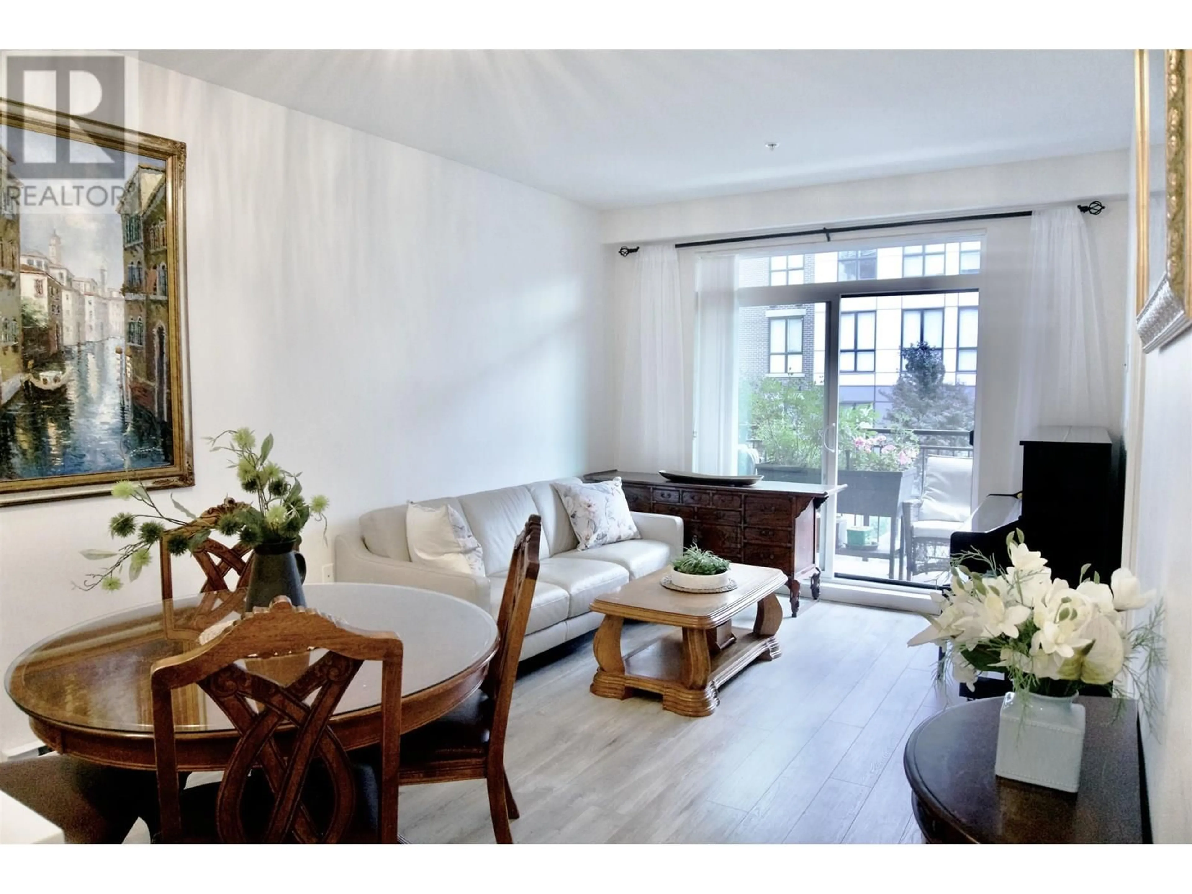 Living room with furniture, wood/laminate floor for 306 - 621 REGAN AVENUE, Coquitlam British Columbia V3J0K1