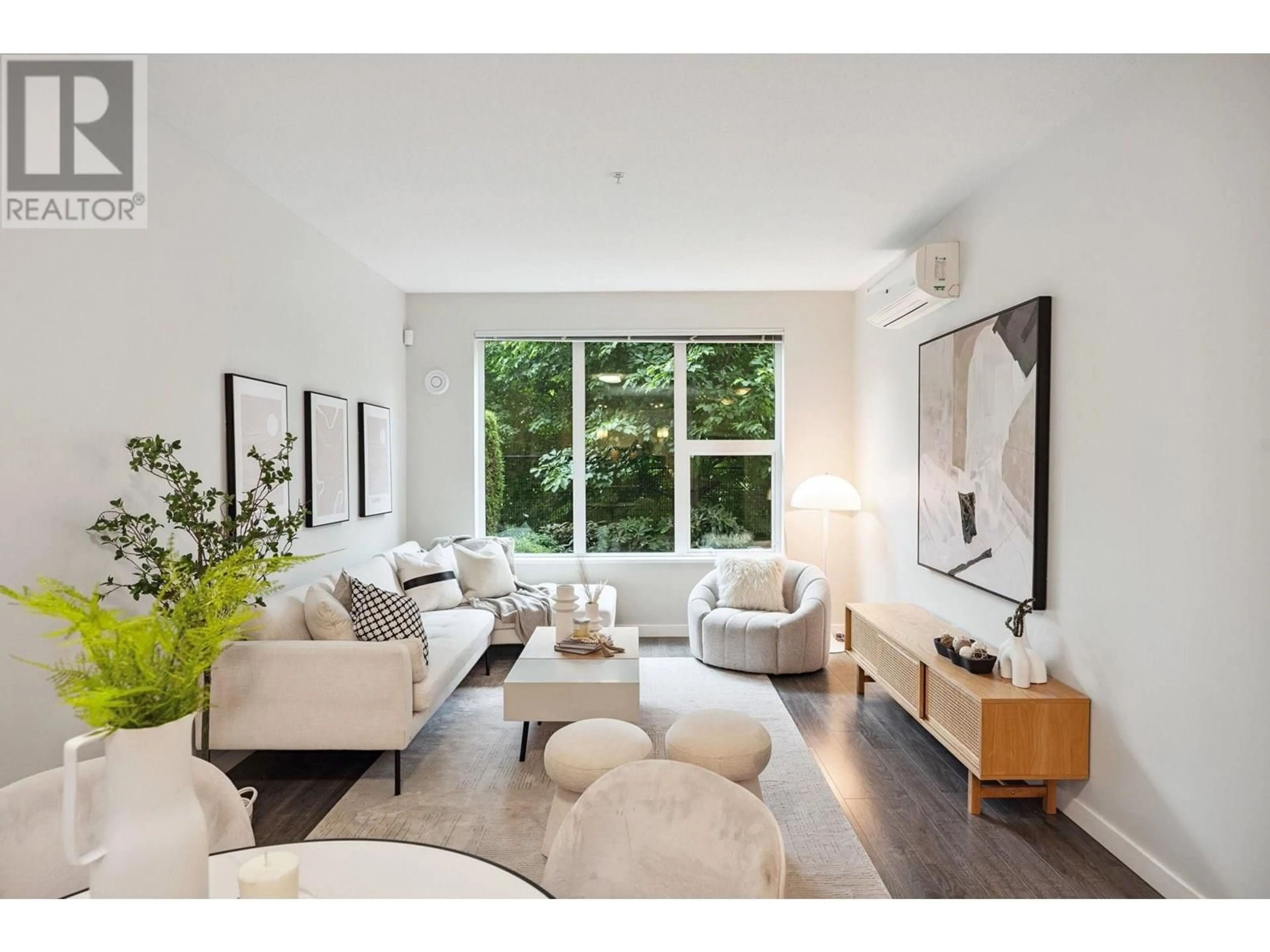Living room with furniture, wood/laminate floor for 122 - 9388 TOMICKI AVENUE, Richmond British Columbia V6X0P1
