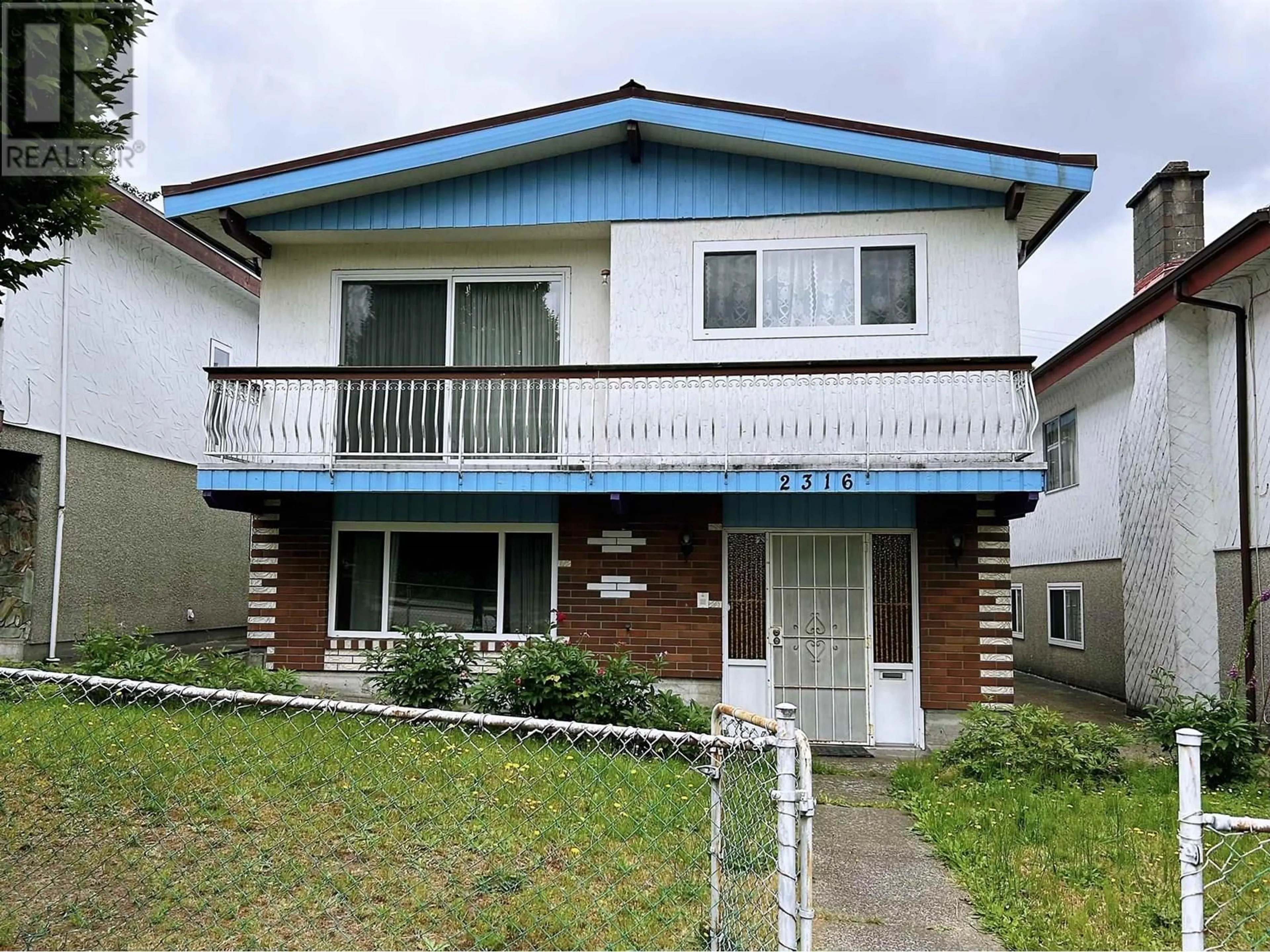 Home with vinyl exterior material, street for 2316 1ST AVENUE, Vancouver British Columbia V5N1C3