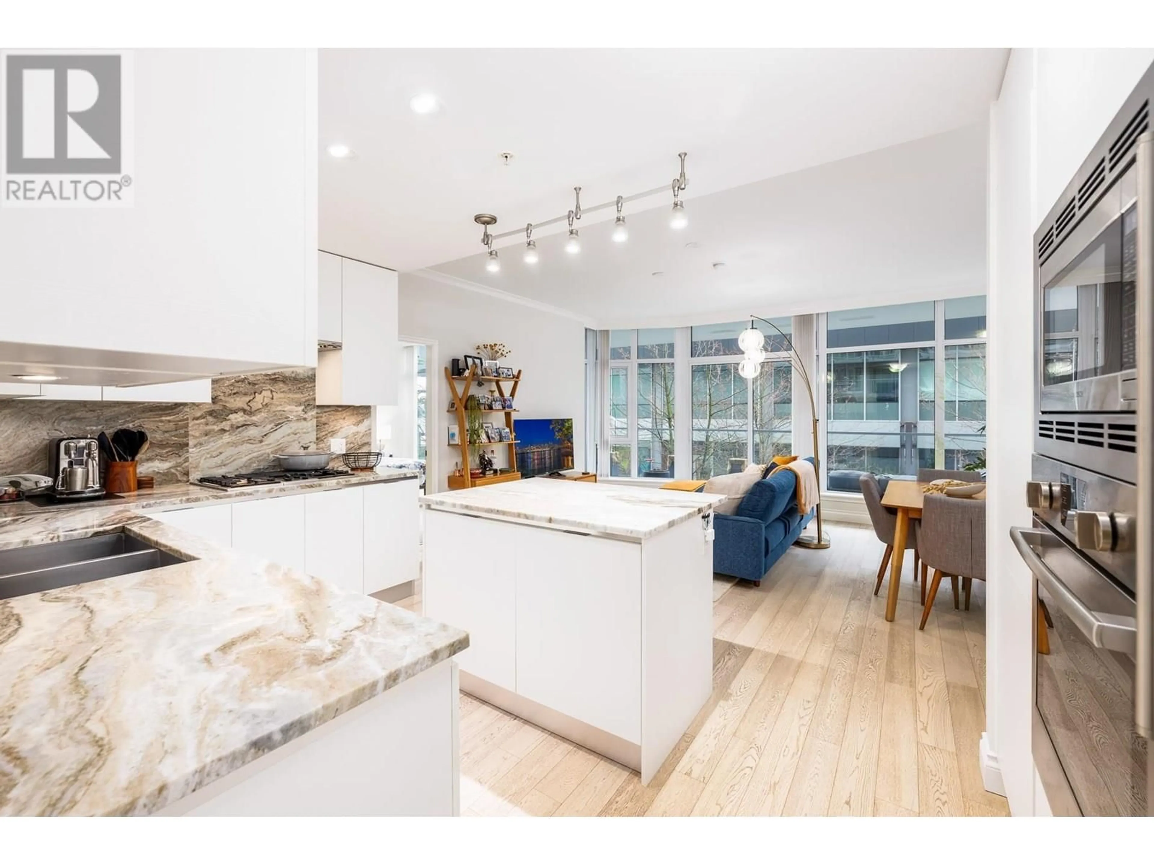 Open concept kitchen, unknown for 207 - 175 VICTORY SHIP WAY, North Vancouver British Columbia V7L0G1