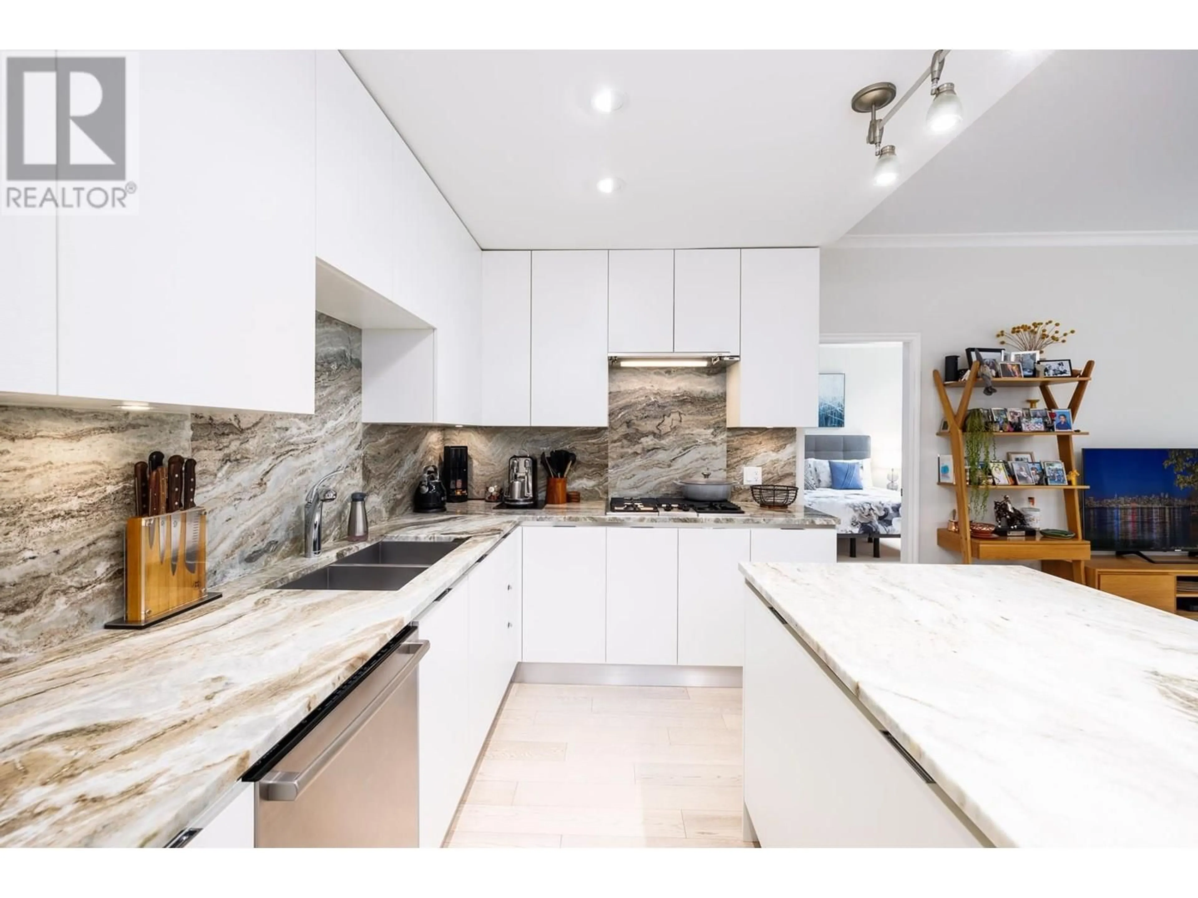Contemporary kitchen, unknown for 207 - 175 VICTORY SHIP WAY, North Vancouver British Columbia V7L0G1