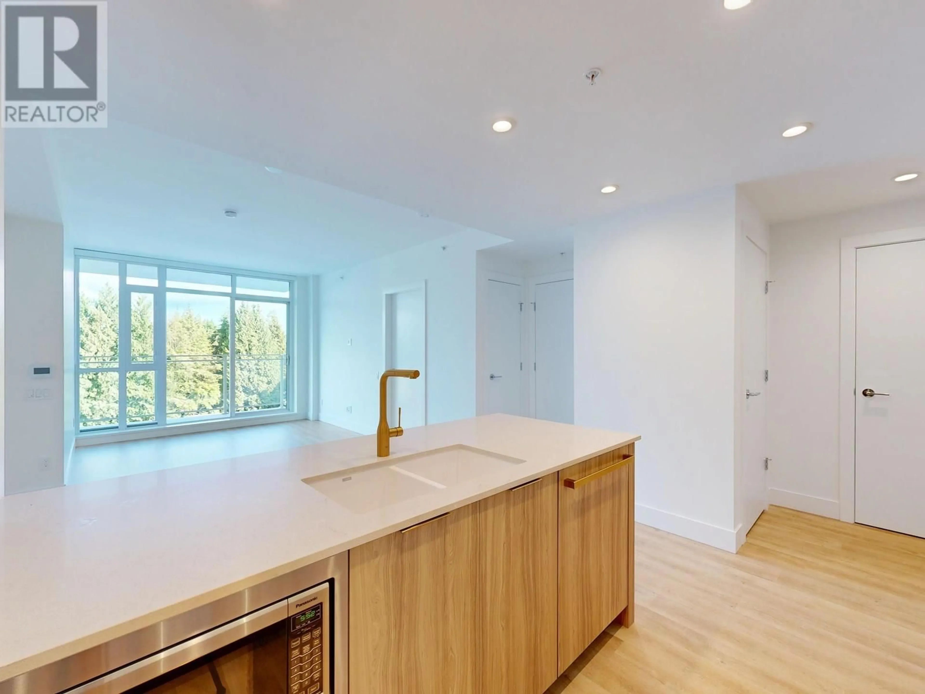 Open concept kitchen, unknown for 401 - 2385 EMERY COURT, North Vancouver British Columbia V7J0G1