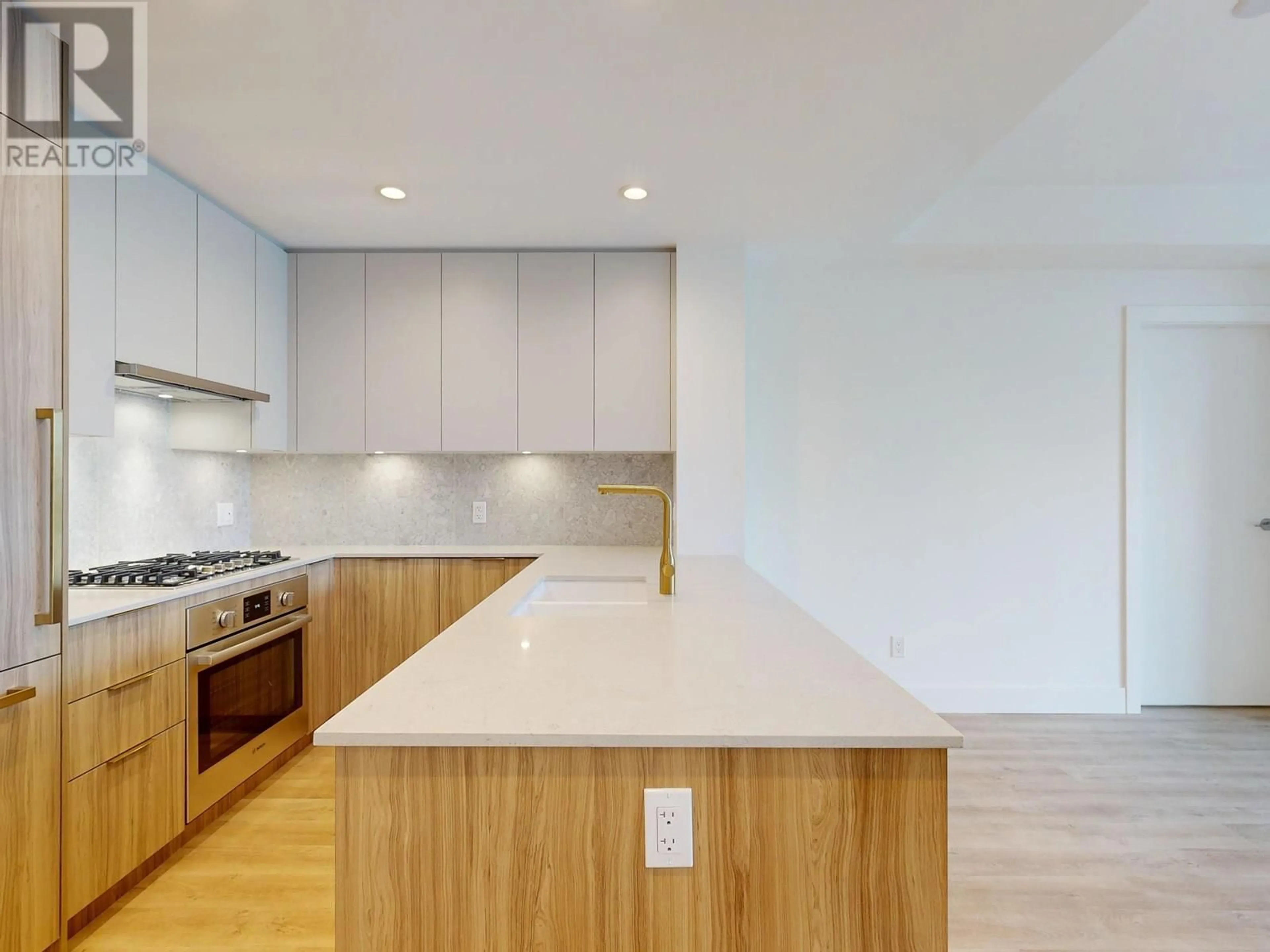 Open concept kitchen, unknown for 401 - 2385 EMERY COURT, North Vancouver British Columbia V7J0G1