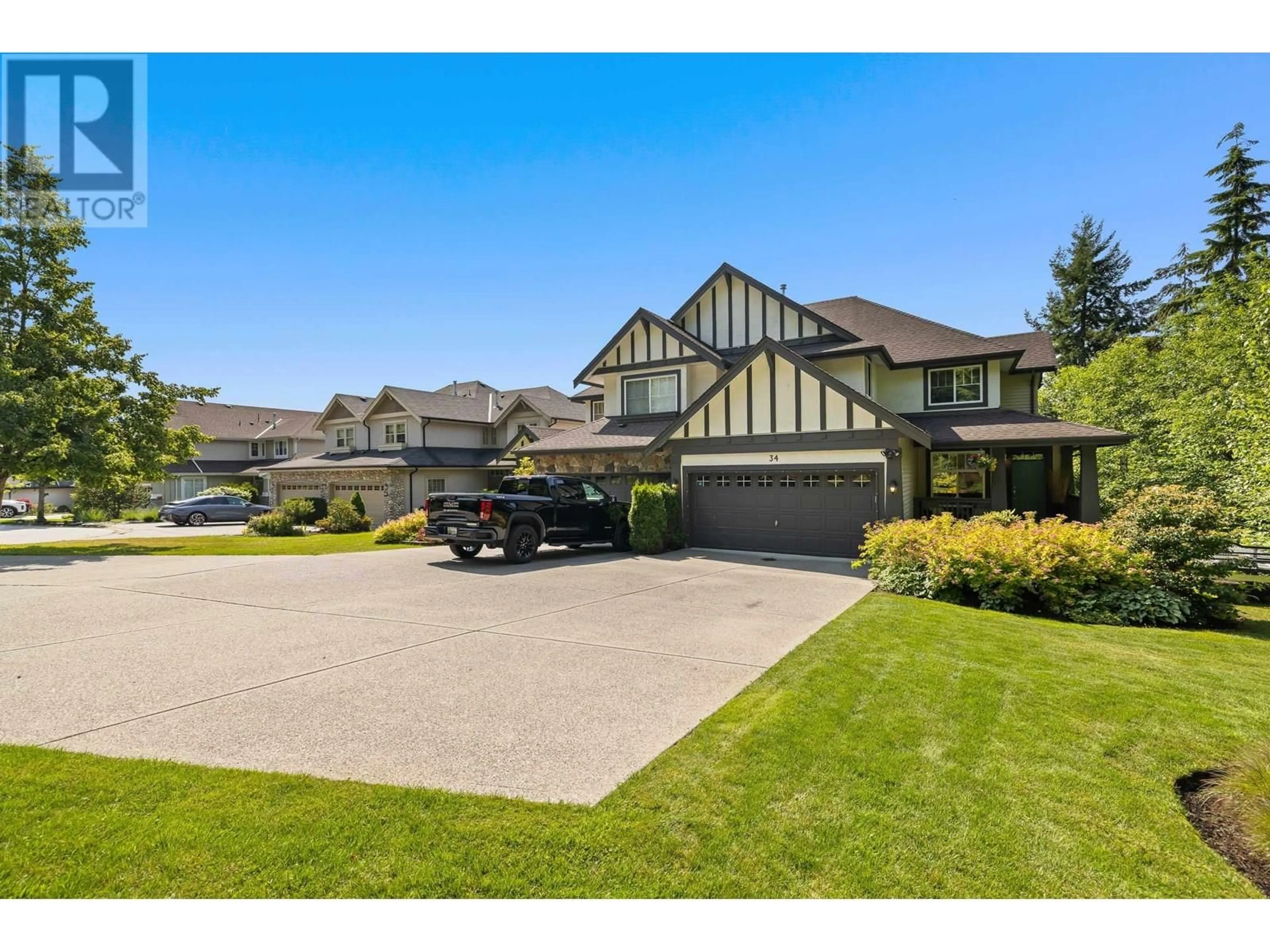 A pic from outside/outdoor area/front of a property/back of a property/a pic from drone, street for 34 HICKORY DRIVE, Port Moody British Columbia V3H5L9