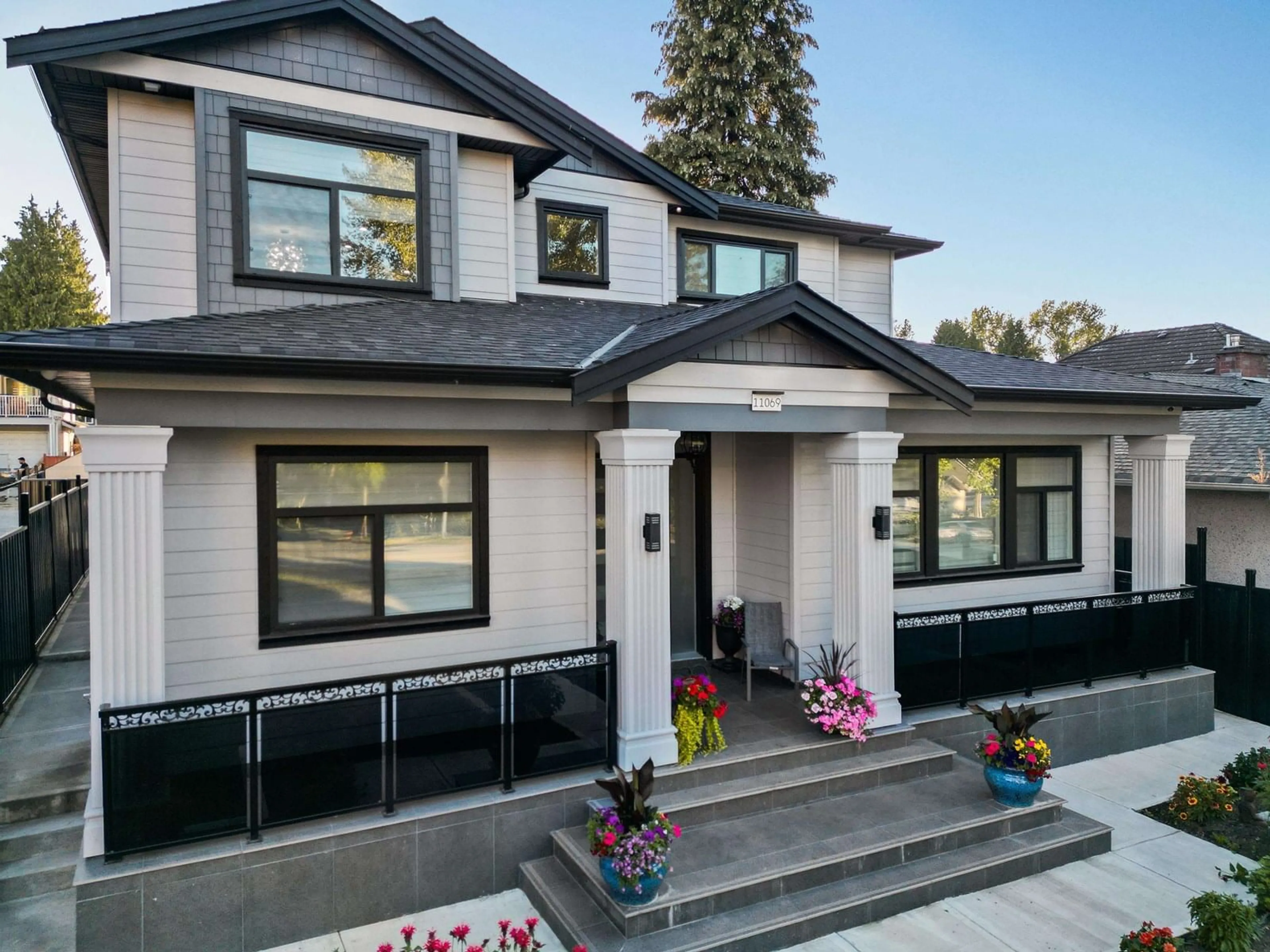 Home with vinyl exterior material, street for 11069 132, Surrey British Columbia V3T3X1