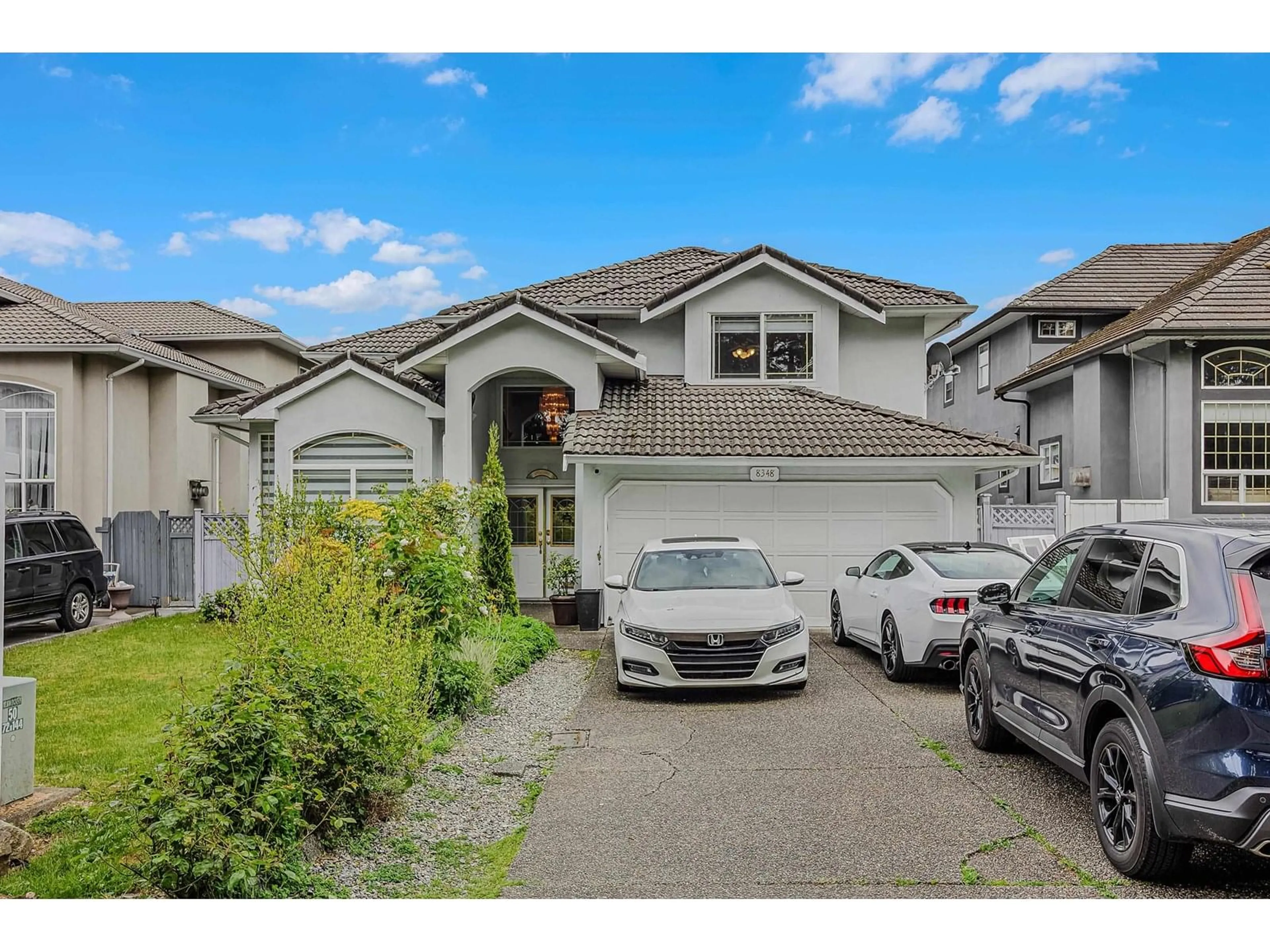 Home with vinyl exterior material, street for 8348 133, Surrey British Columbia V3W1E4
