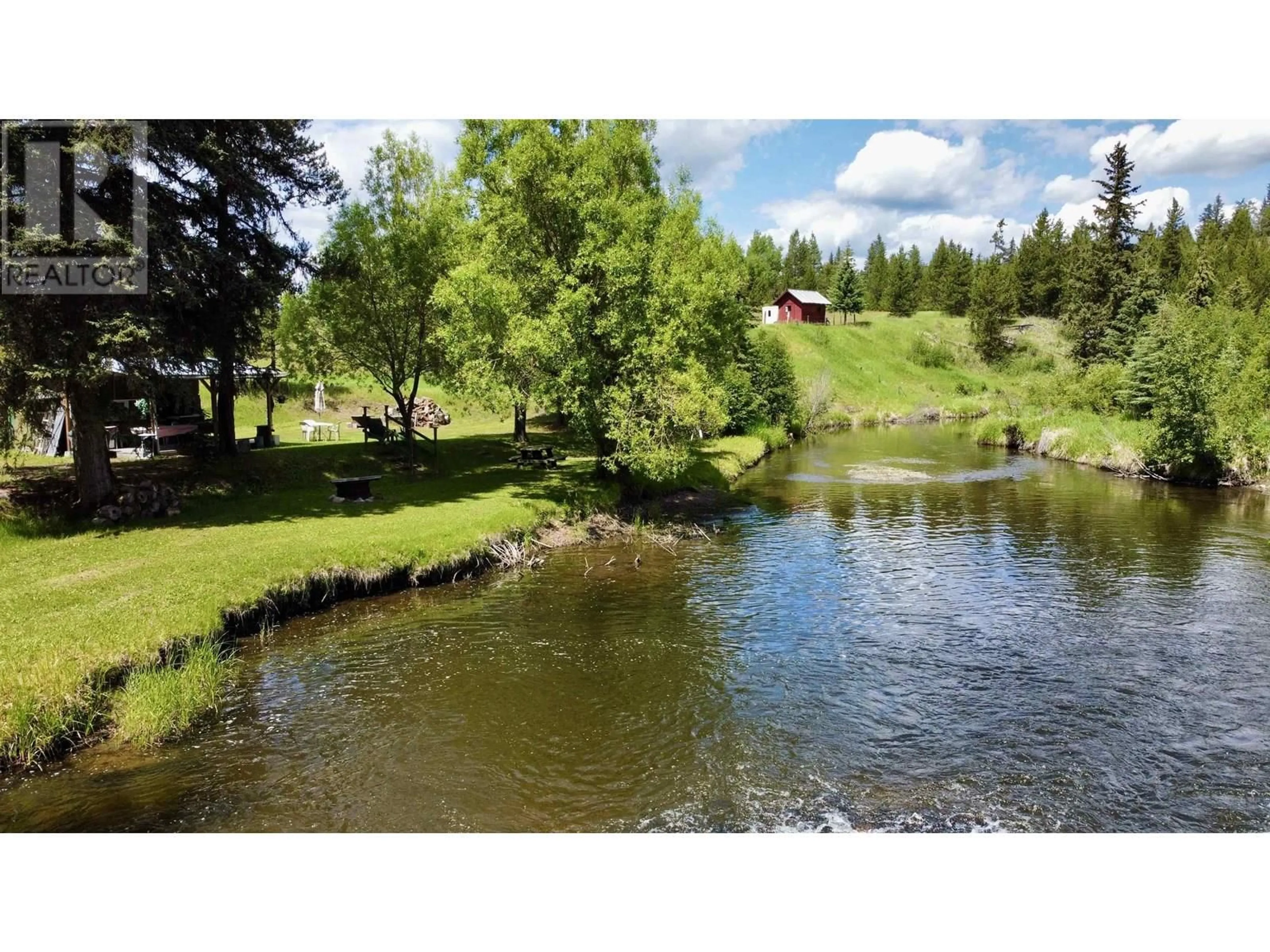A pic from outside/outdoor area/front of a property/back of a property/a pic from drone, water/lake/river/ocean view for 5307 CANIM HENDRIX LAKE ROAD, 100 Mile House British Columbia V0K2E1