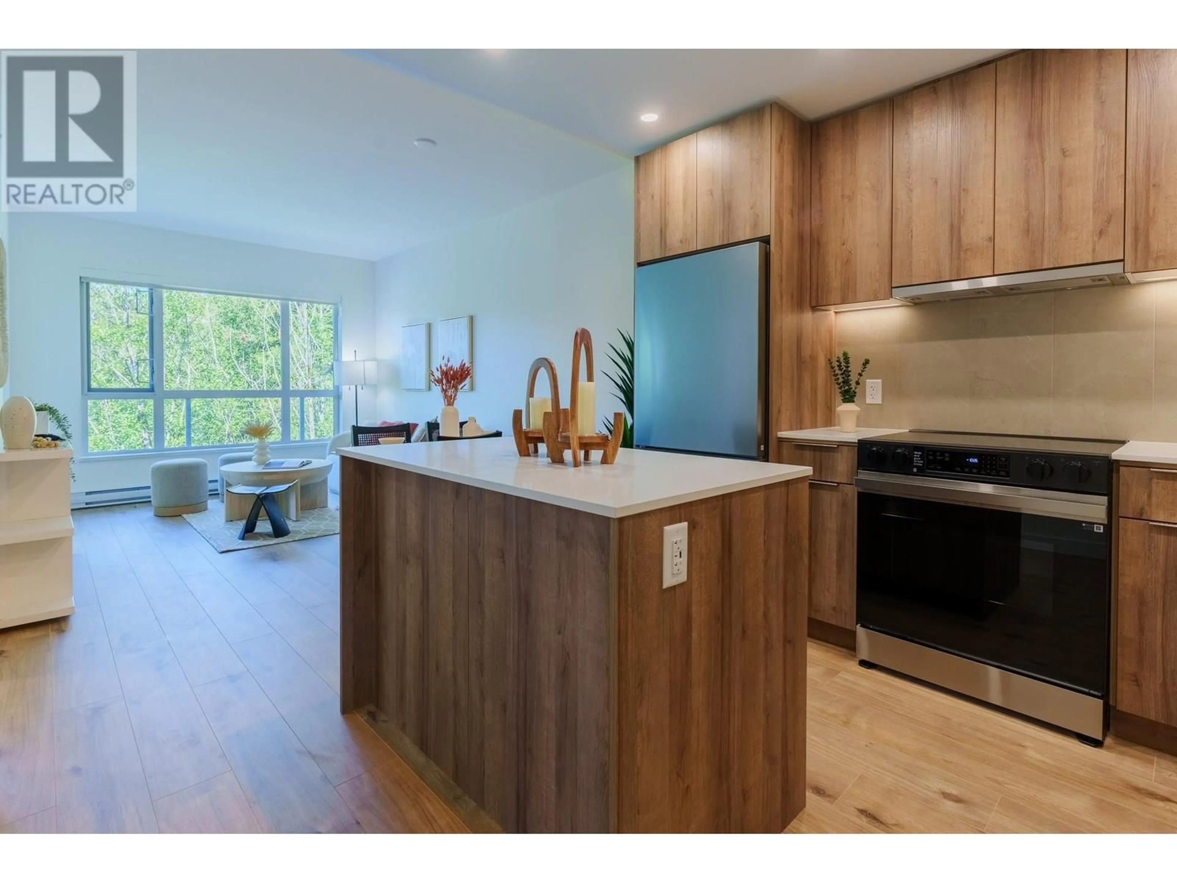 Open concept kitchen, wood/laminate floor for 3594 MALSUM DRIVE, Vancouver British Columbia V7G0B4