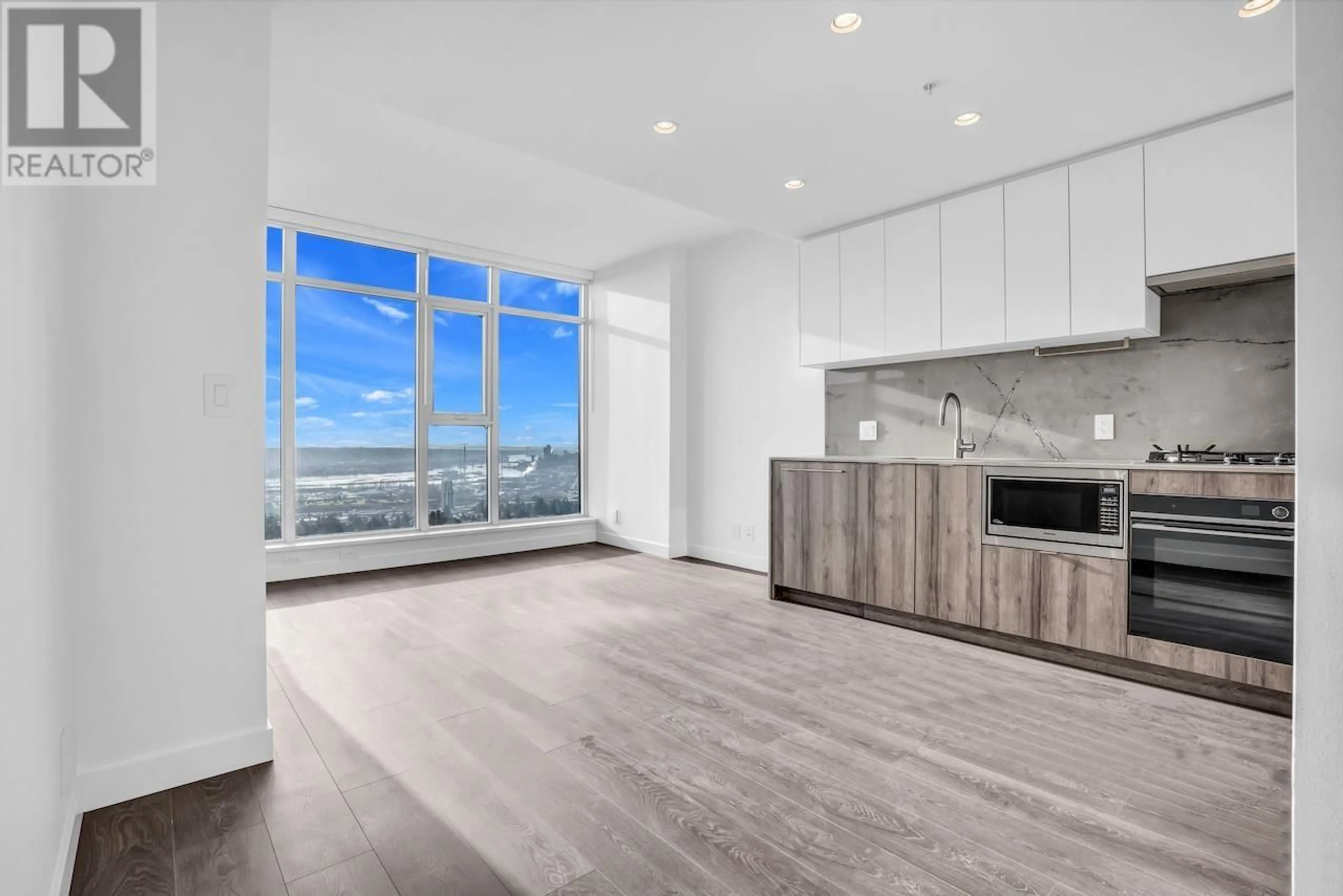 Open concept kitchen, wood/laminate floor for 1603 - 505 NELSON STREET, Coquitlam British Columbia V3J0R5