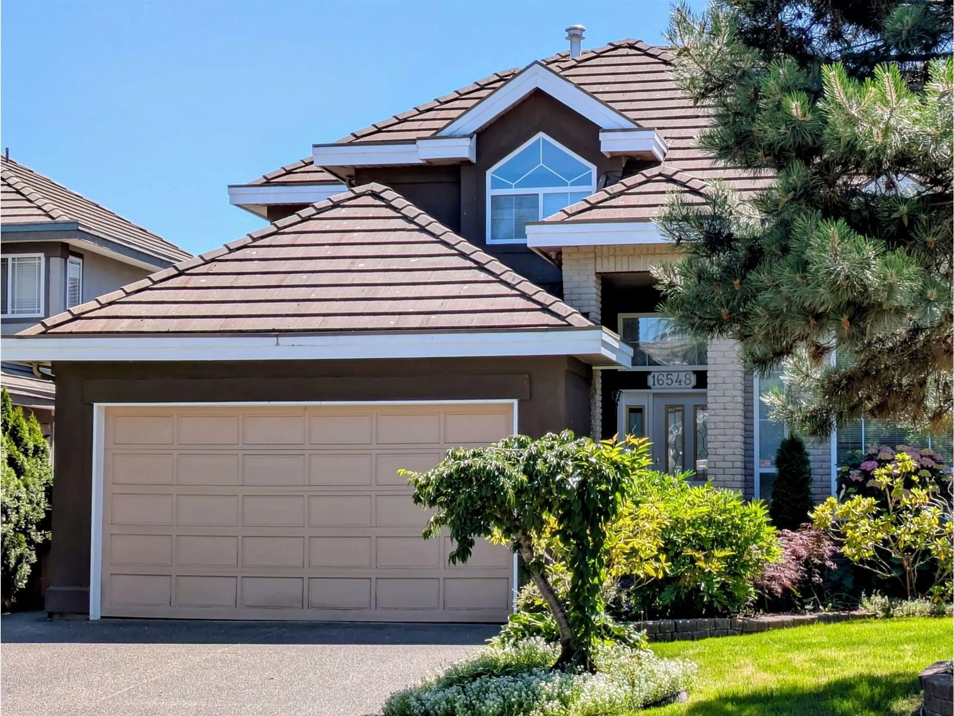 Home with vinyl exterior material, street for 16548 108A, Surrey British Columbia V4N5B9