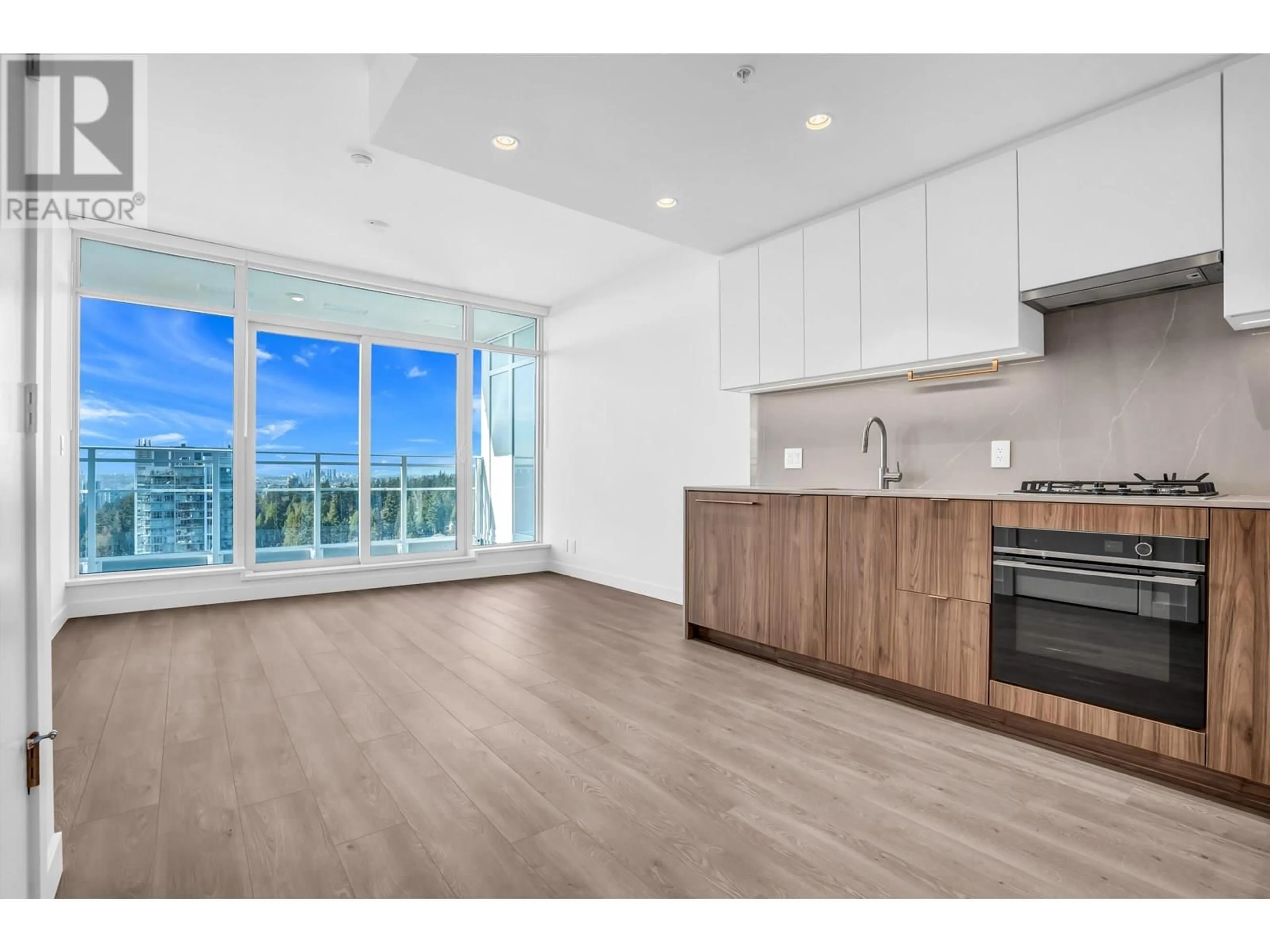 Open concept kitchen, wood/laminate floor for 1605 - 505 NELSON STREET, Coquitlam British Columbia V3J0R5