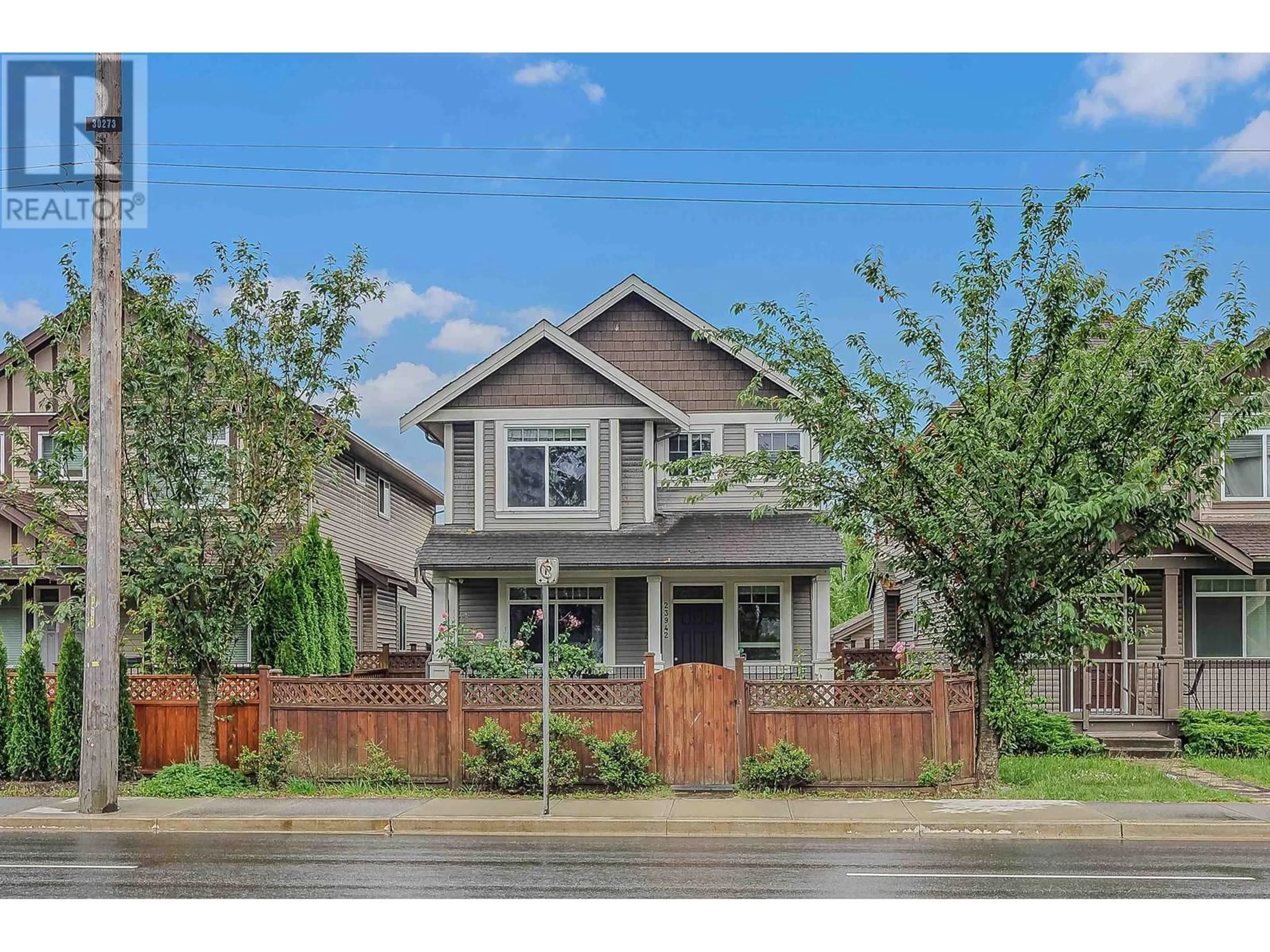 Home with vinyl exterior material, street for 23942 DEWDNEY TRUNK ROAD, Maple Ridge British Columbia V4R1W2