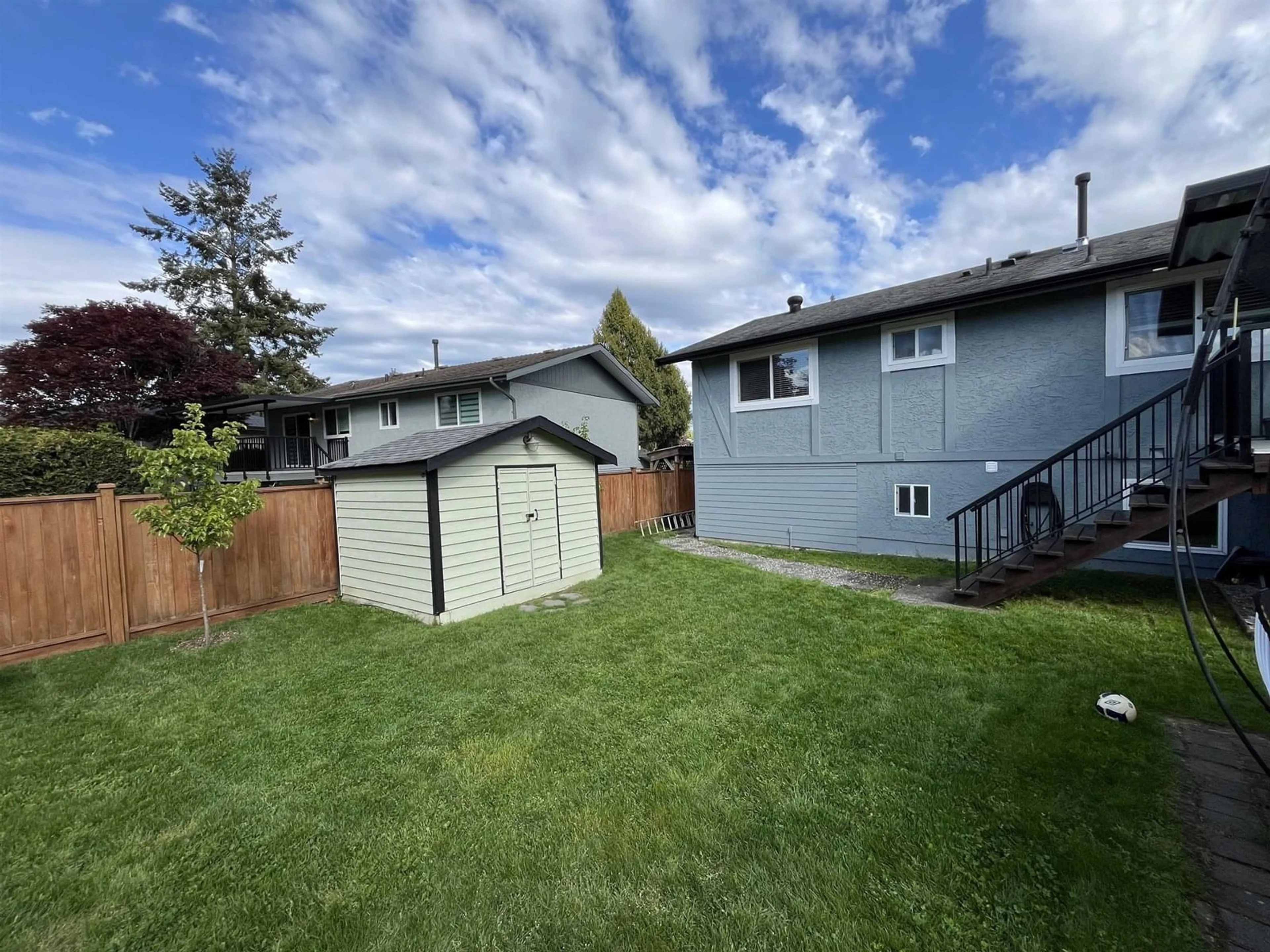 A pic from outside/outdoor area/front of a property/back of a property/a pic from drone, street for 8945 MITCHELL, Delta British Columbia V4C7G8