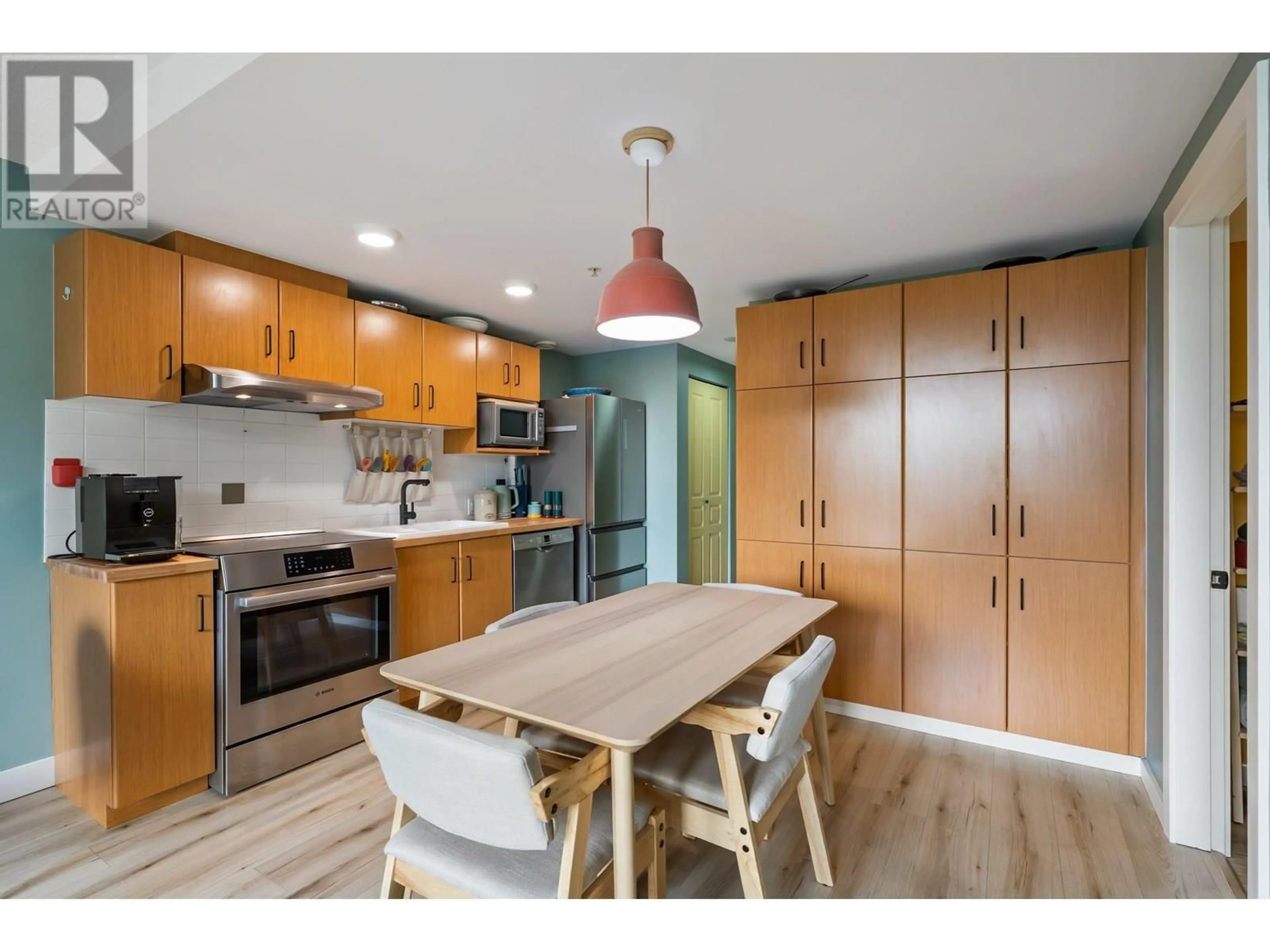 Open concept kitchen, wood/laminate floor for 309 - 9298 UNIVERSITY CRESCENT, Burnaby British Columbia V5A4X8