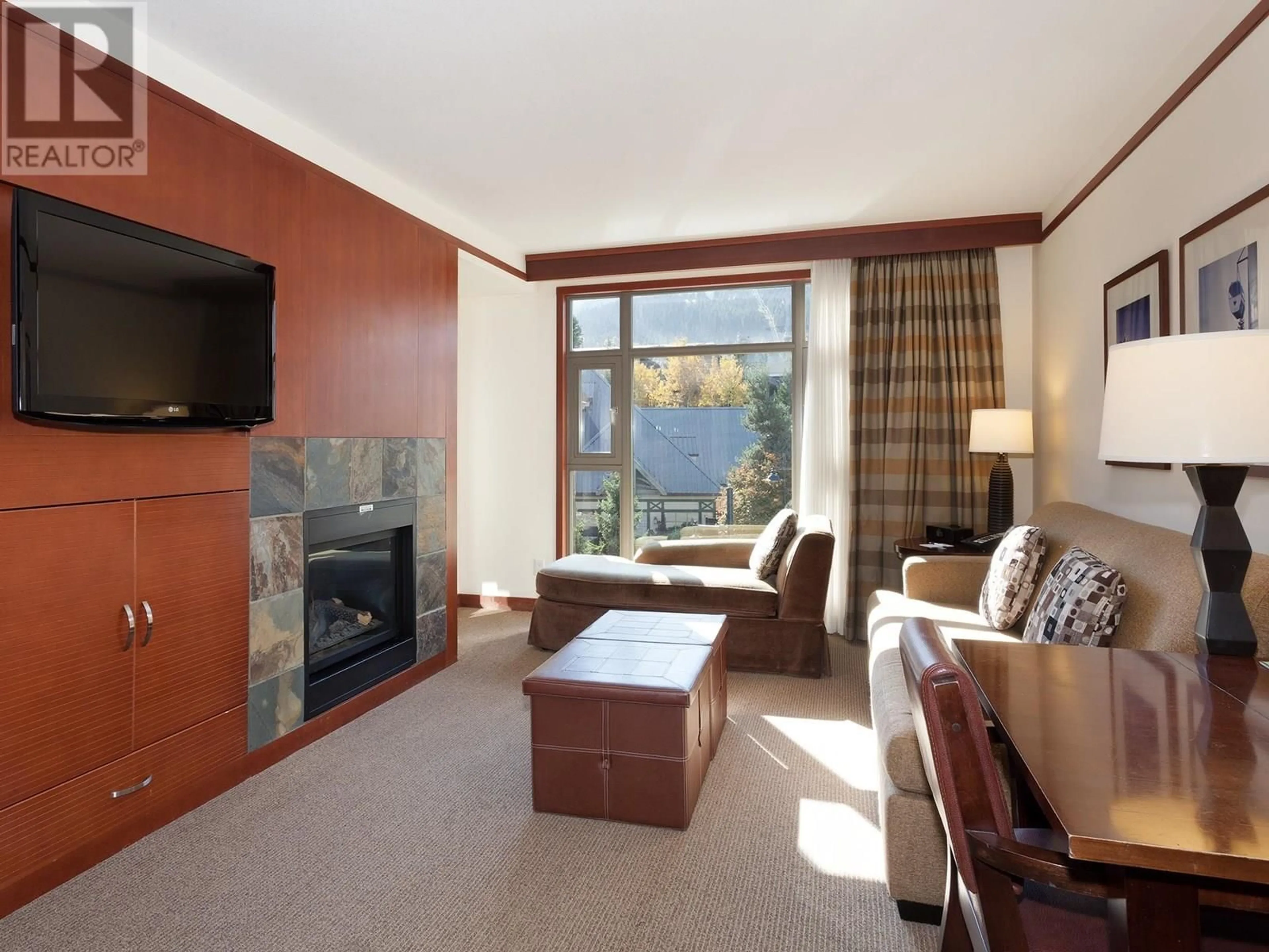 Living room with furniture, unknown for 6613 - 4299 BLACKCOMB WAY, Whistler British Columbia V8E0X3
