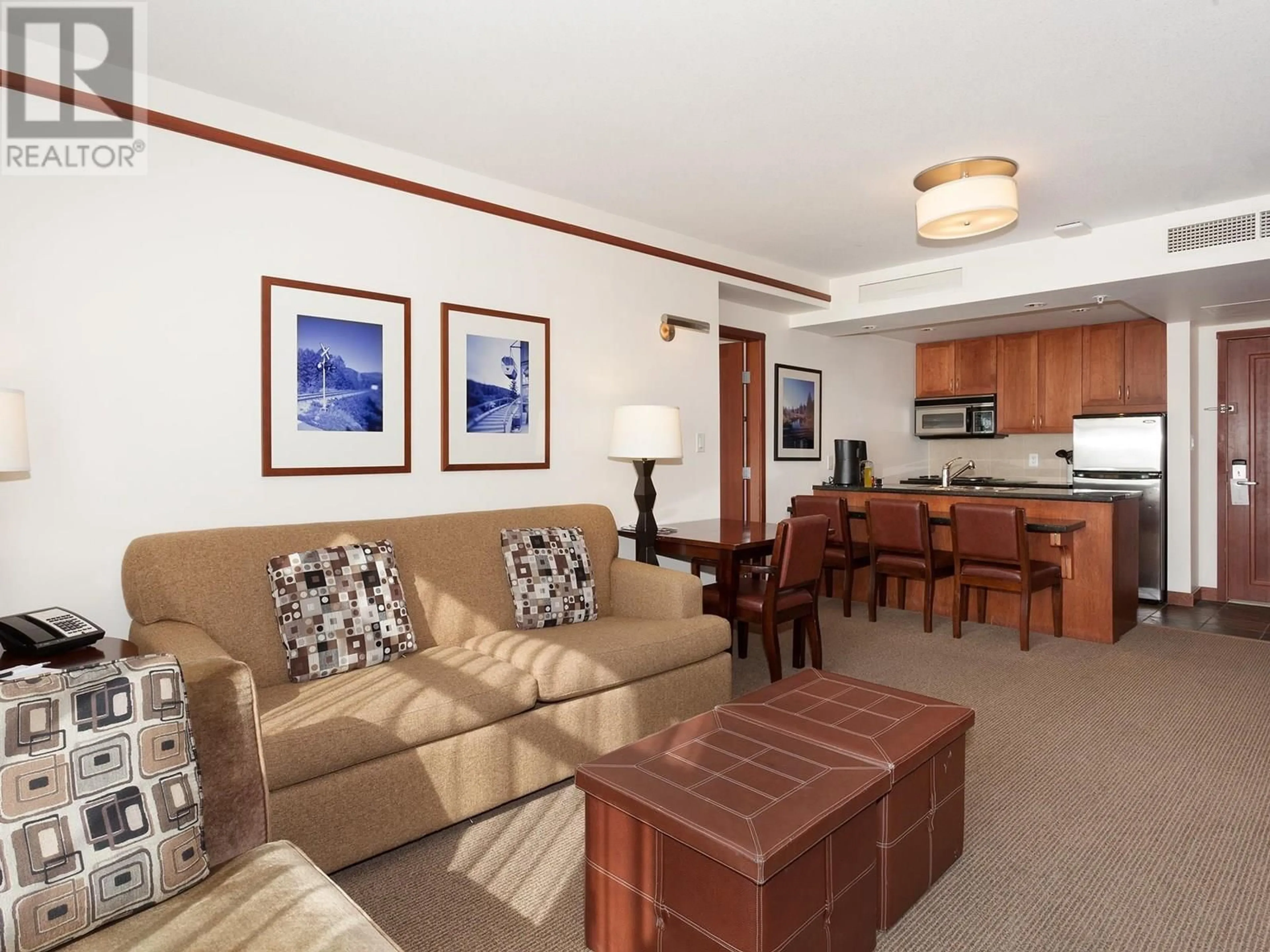 Living room with furniture, unknown for 6613 - 4299 BLACKCOMB WAY, Whistler British Columbia V8E0X3