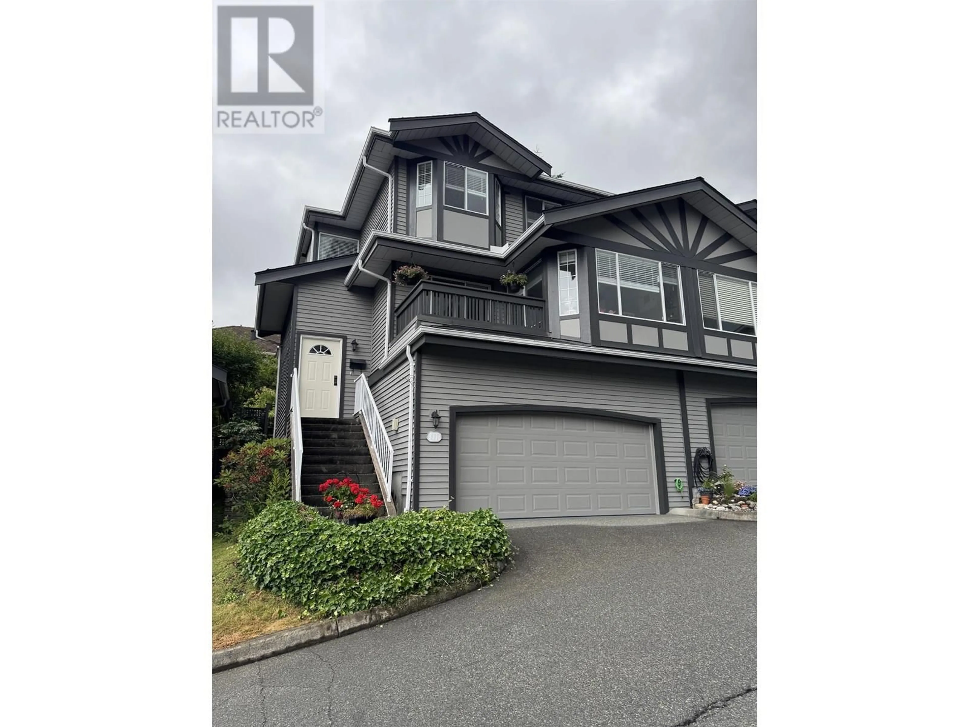 Home with vinyl exterior material, street for 111 - 1685 PINETREE WAY, Coquitlam British Columbia V3E3A1