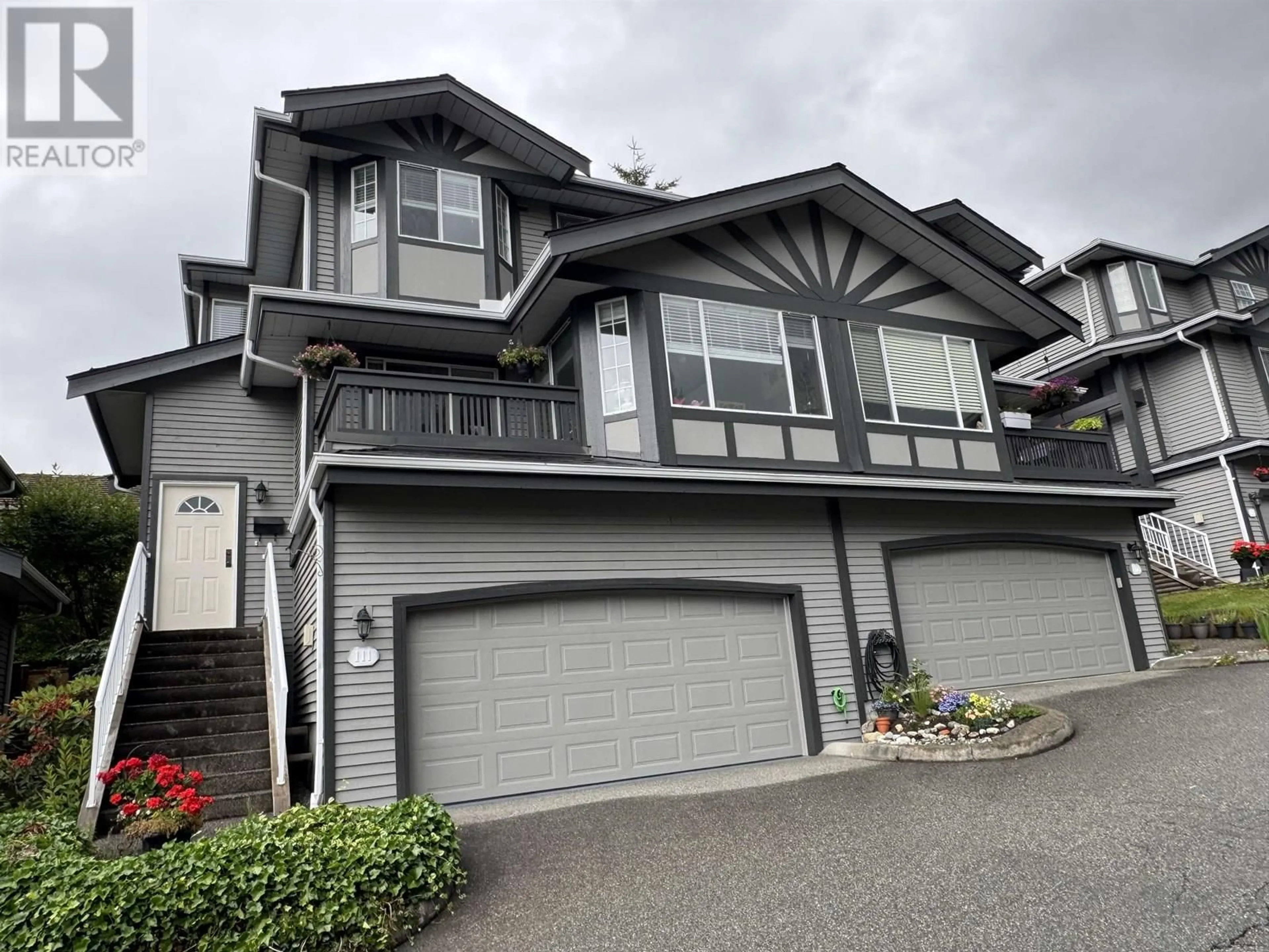 Home with vinyl exterior material, street for 111 - 1685 PINETREE WAY, Coquitlam British Columbia V3E3A1