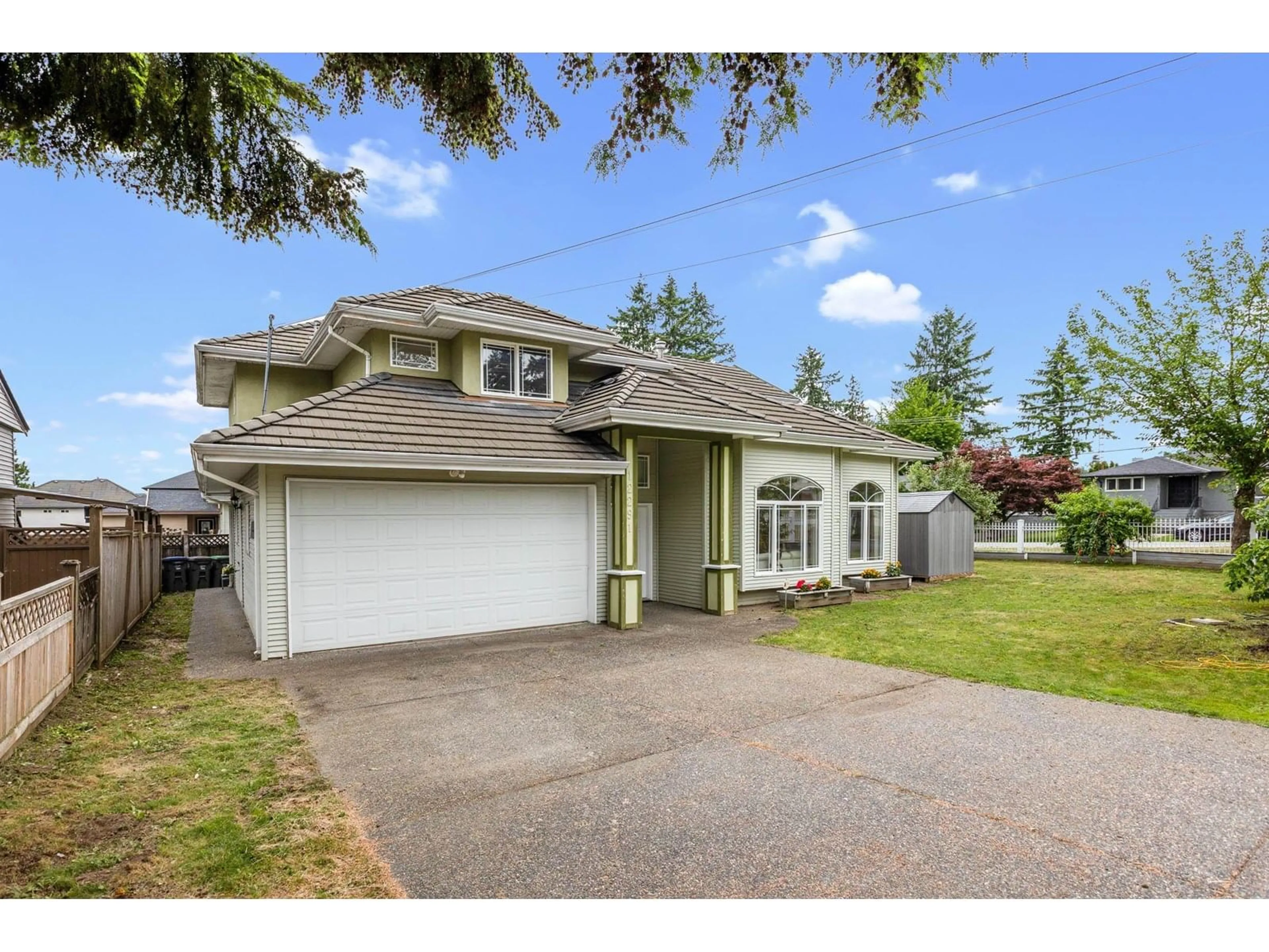 Home with vinyl exterior material, street for 12291 100, Surrey British Columbia V3V2W9