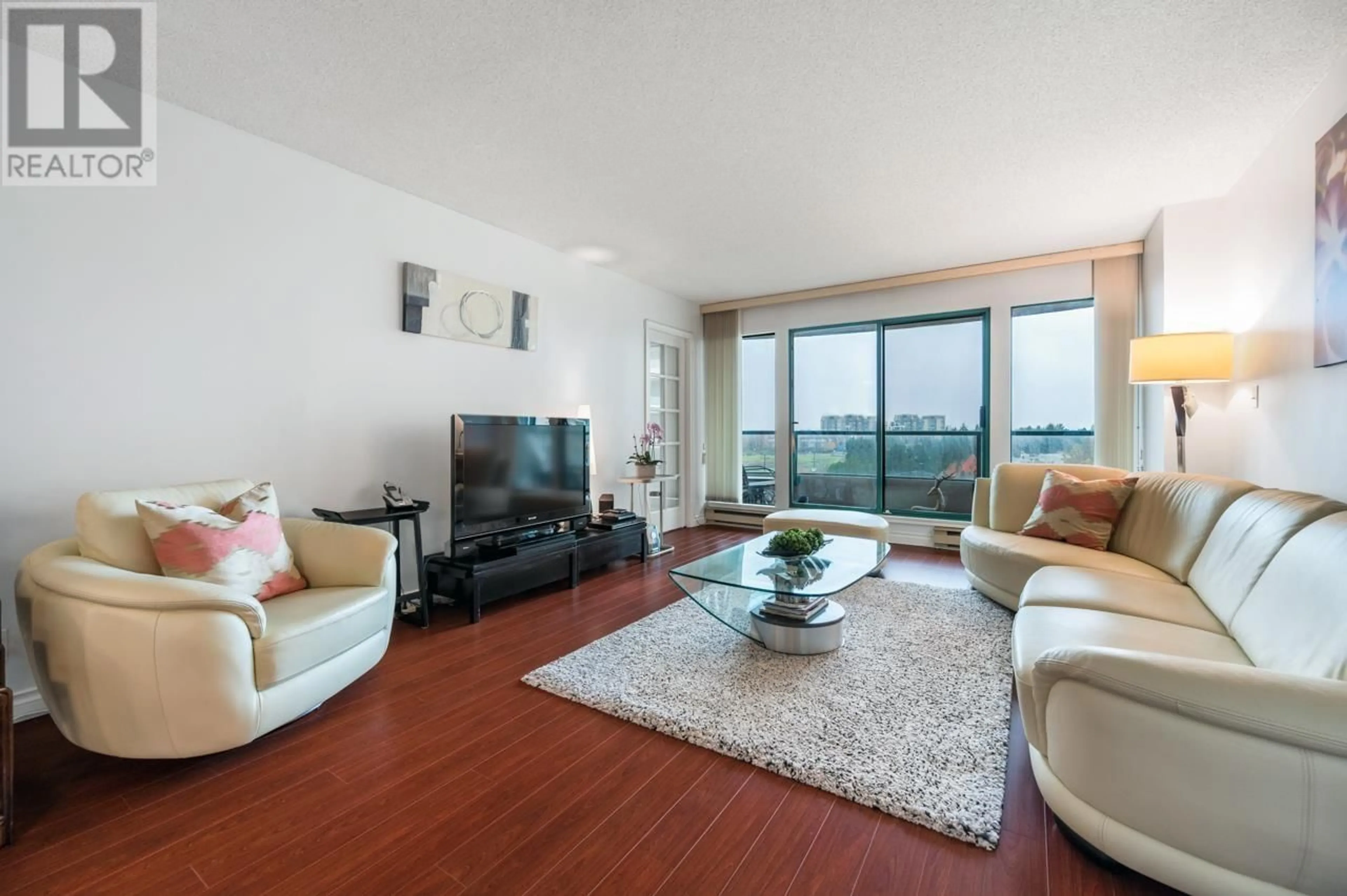Living room with furniture, wood/laminate floor for 902 - 8831 LANSDOWNE ROAD, Richmond British Columbia V6X3T5