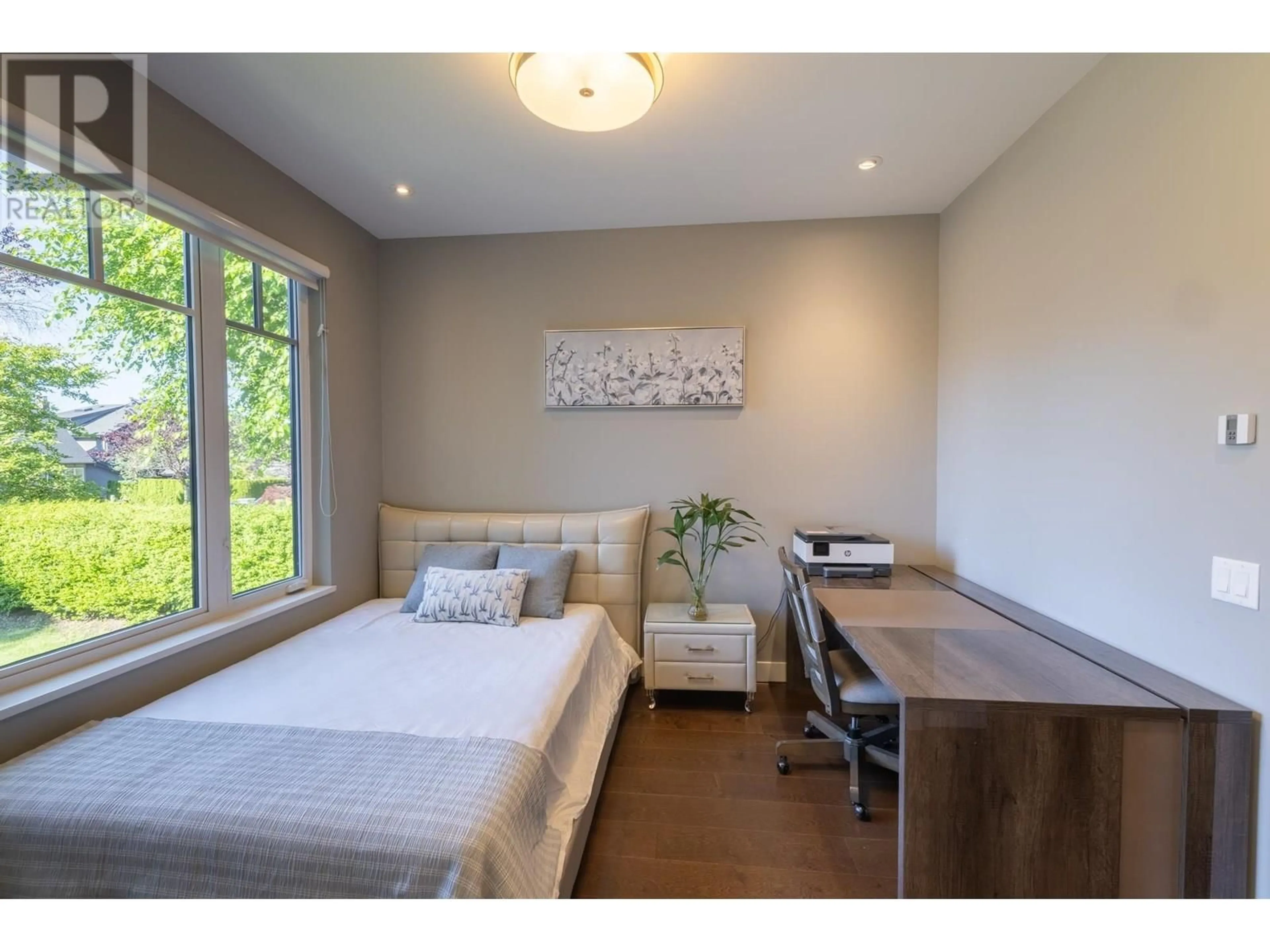 Bedroom with bed, wood/laminate floor for 3409 32ND AVENUE, Vancouver British Columbia V6S1Y8