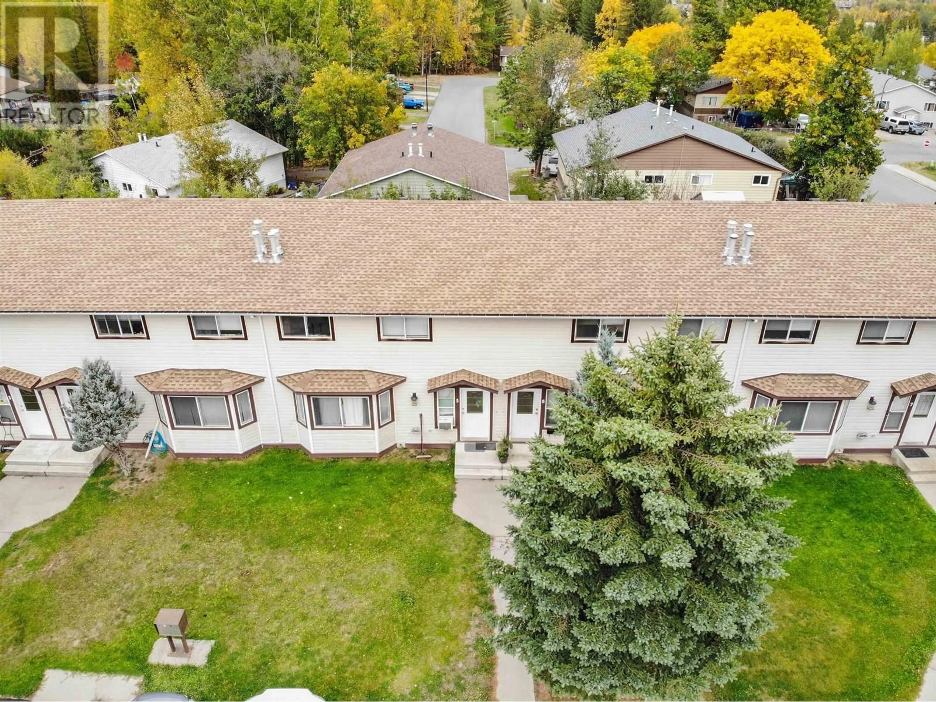 A pic from outside/outdoor area/front of a property/back of a property/a pic from drone, mountain view for 410 PINCHBECK STREET, Quesnel British Columbia V2J6A3