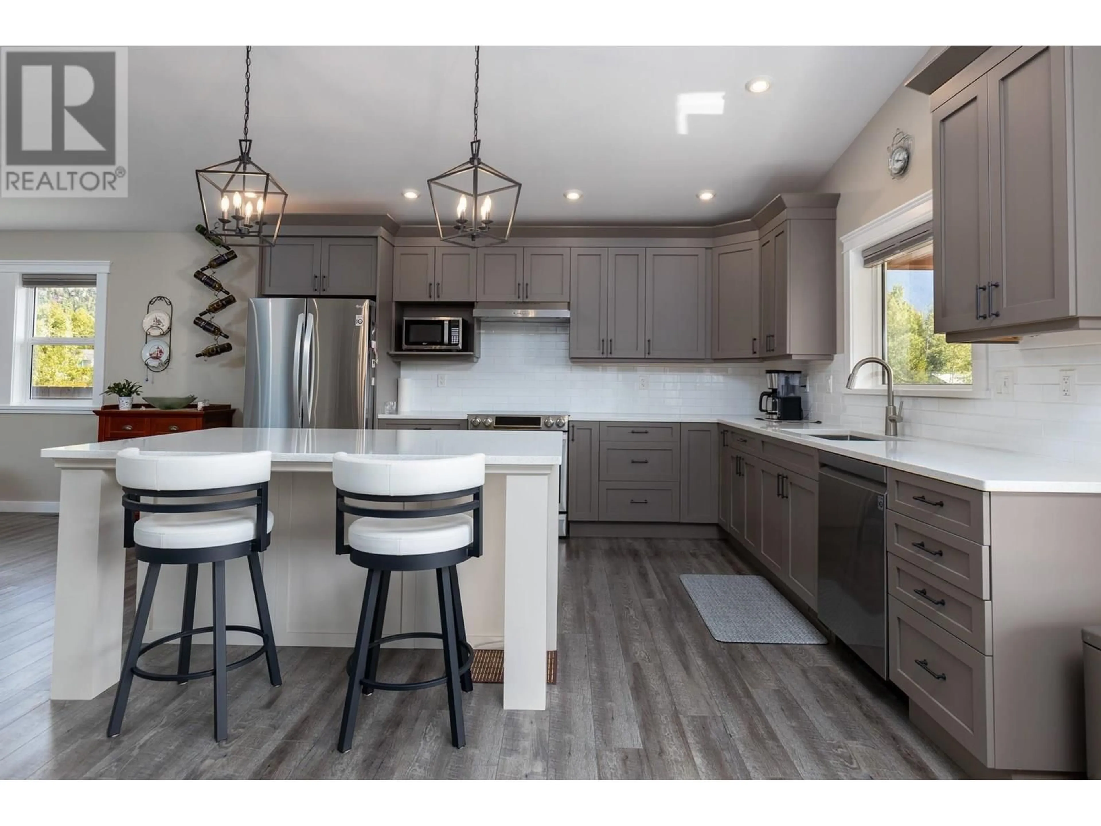 Open concept kitchen, wood/laminate floor for 3569 NEWELL AVENUE, Terrace British Columbia V8G5A5