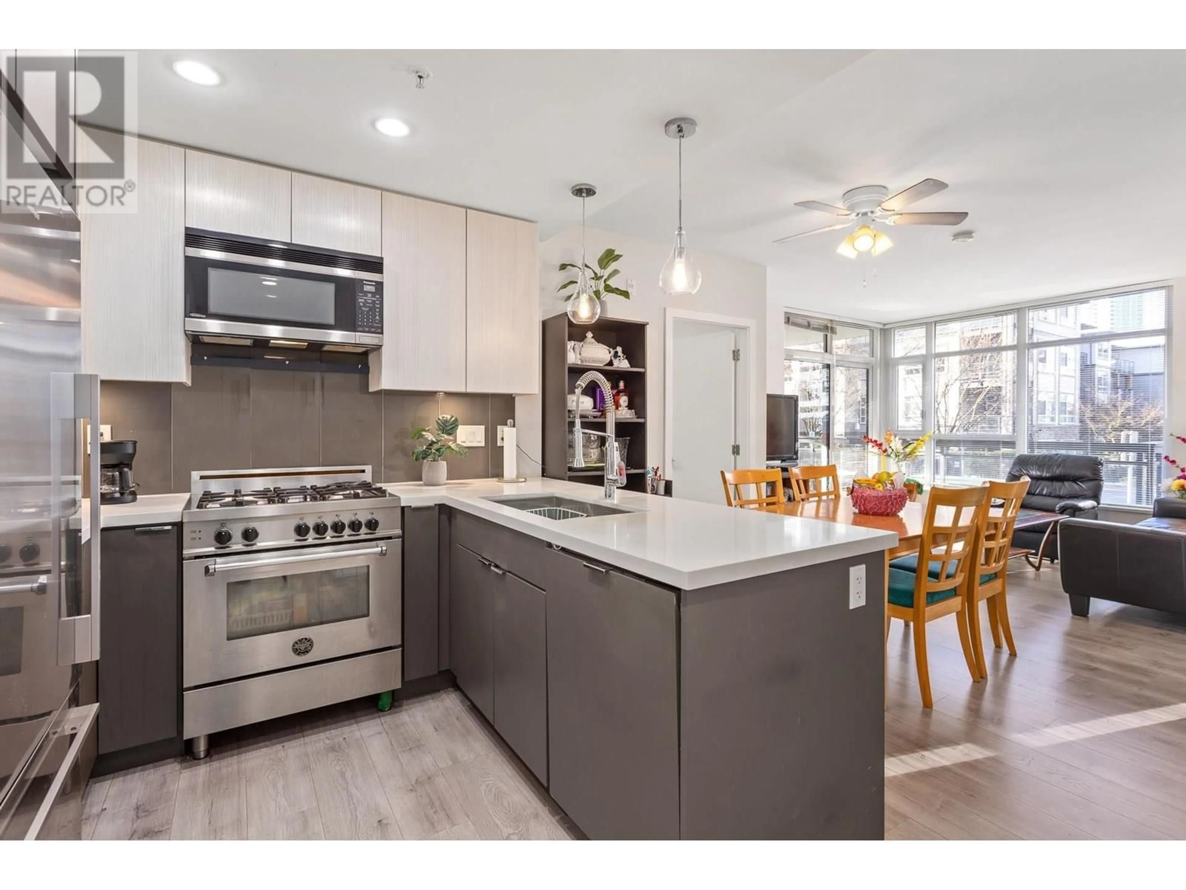 Open concept kitchen, ceramic/tile floor for 103 - 711 BRESLAY STREET, Coquitlam British Columbia V3J0G7