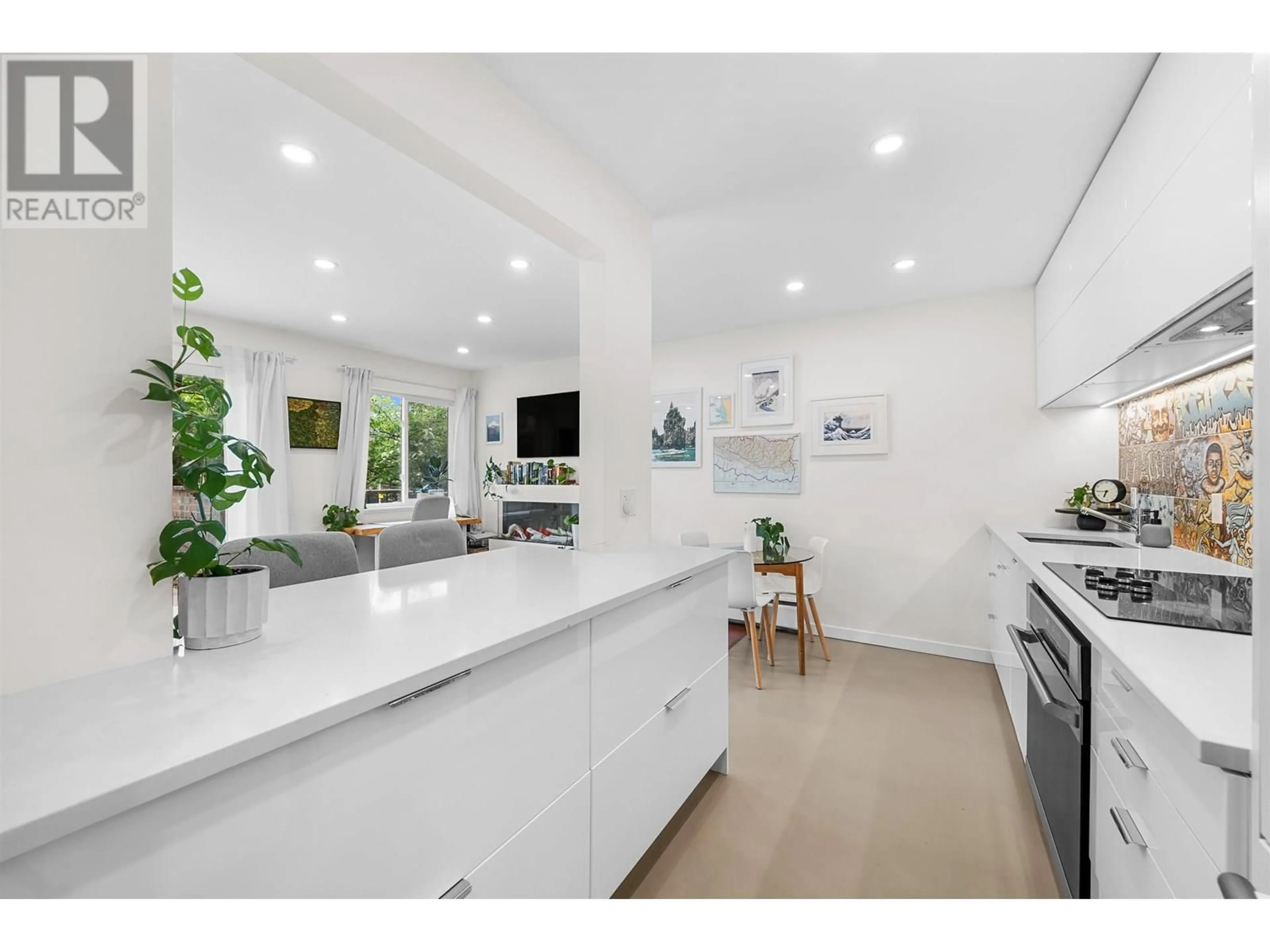 Open concept kitchen, ceramic/tile floor for 101 - 241 ST. ANDREWS AVENUE, North Vancouver British Columbia V7L3K8
