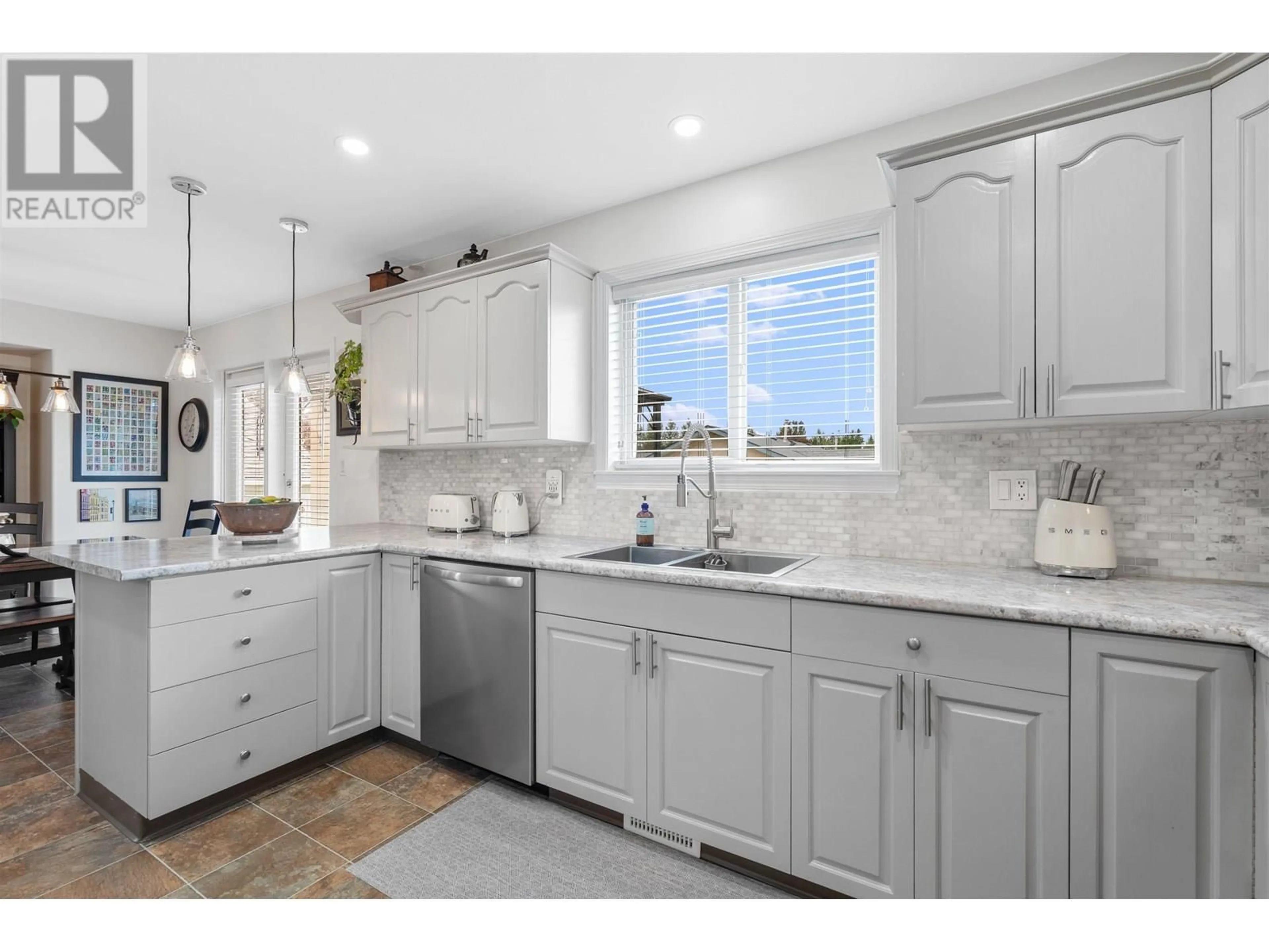 Open concept kitchen, ceramic/tile floor for 6845 WESTGATE AVENUE, Prince George British Columbia V2N5R2