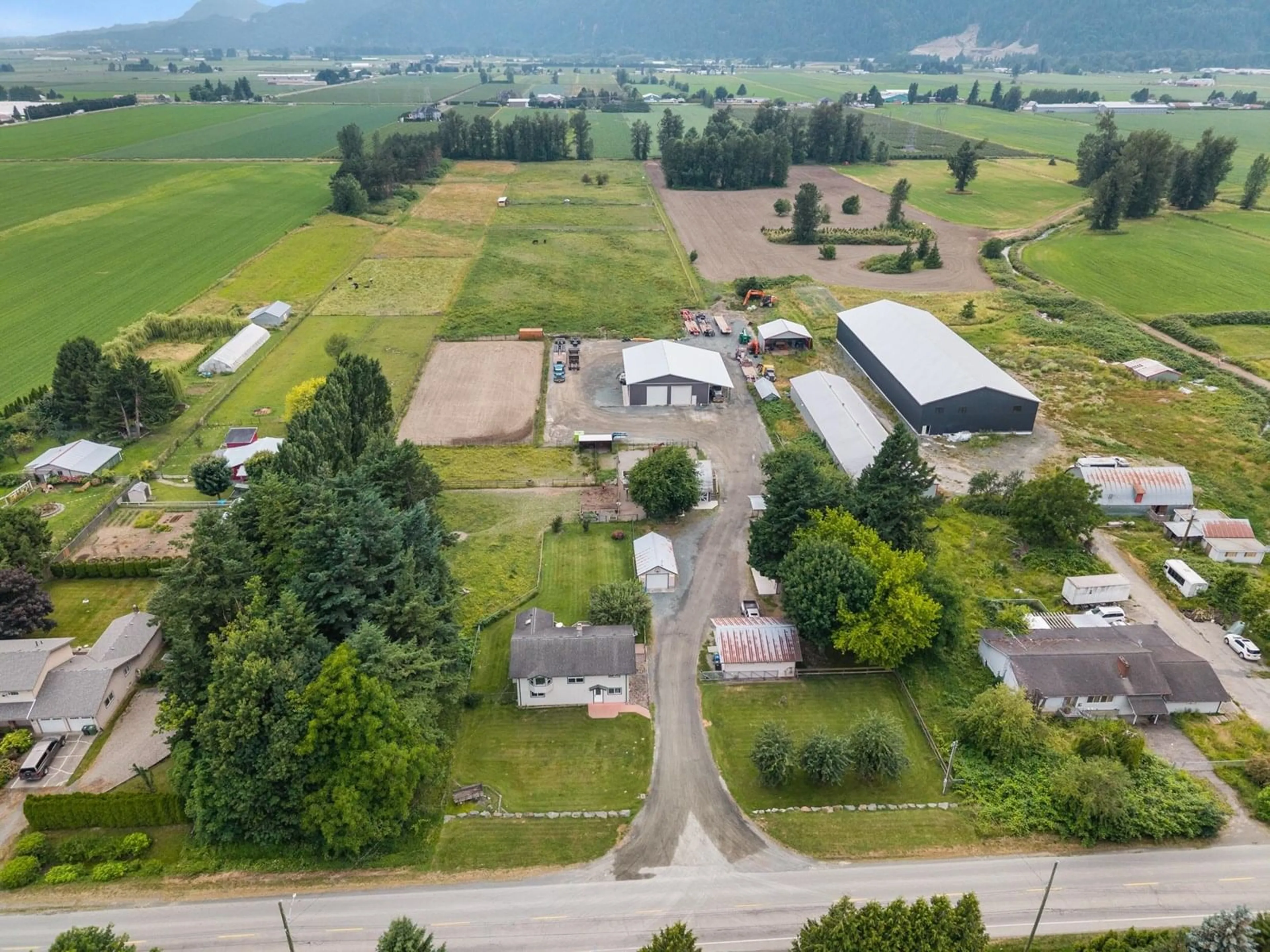 A pic from outside/outdoor area/front of a property/back of a property/a pic from drone, mountain view for 5063 BOUNDARY, Abbotsford British Columbia V3G2N4