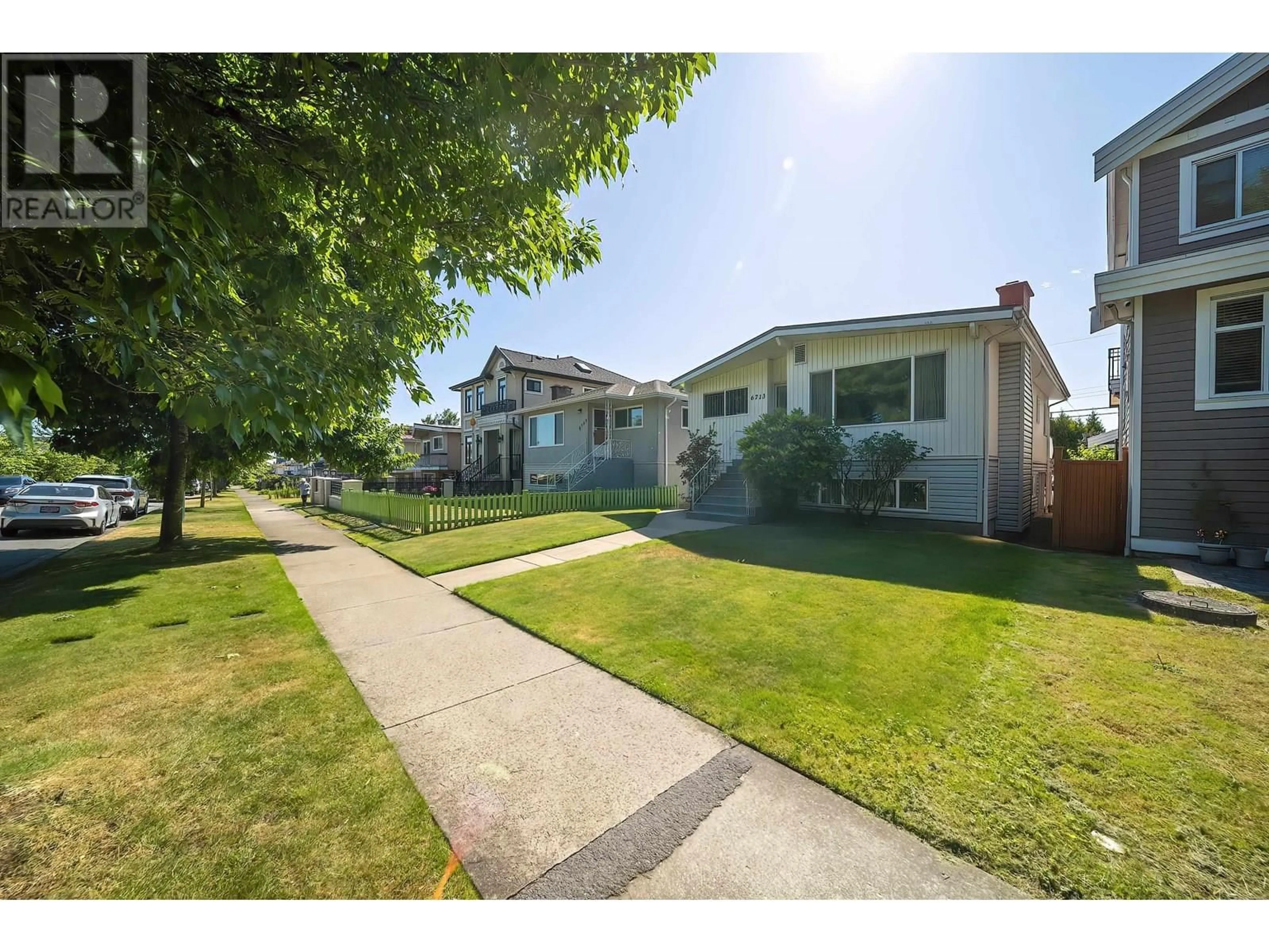 A pic from outside/outdoor area/front of a property/back of a property/a pic from drone, street for 6713 LANARK STREET, Vancouver British Columbia V5P2Z5