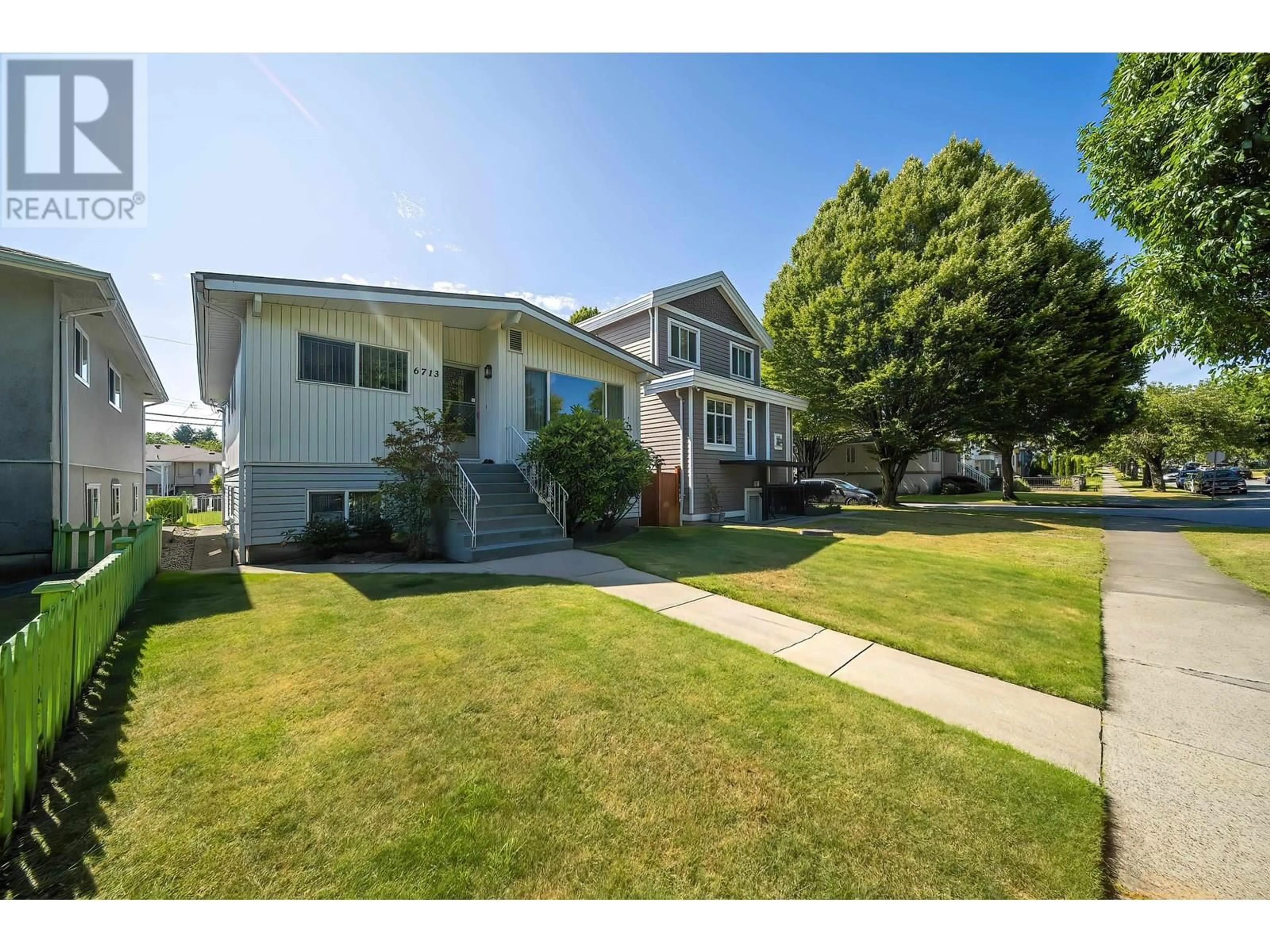 Home with vinyl exterior material, street for 6713 LANARK STREET, Vancouver British Columbia V5P2Z5