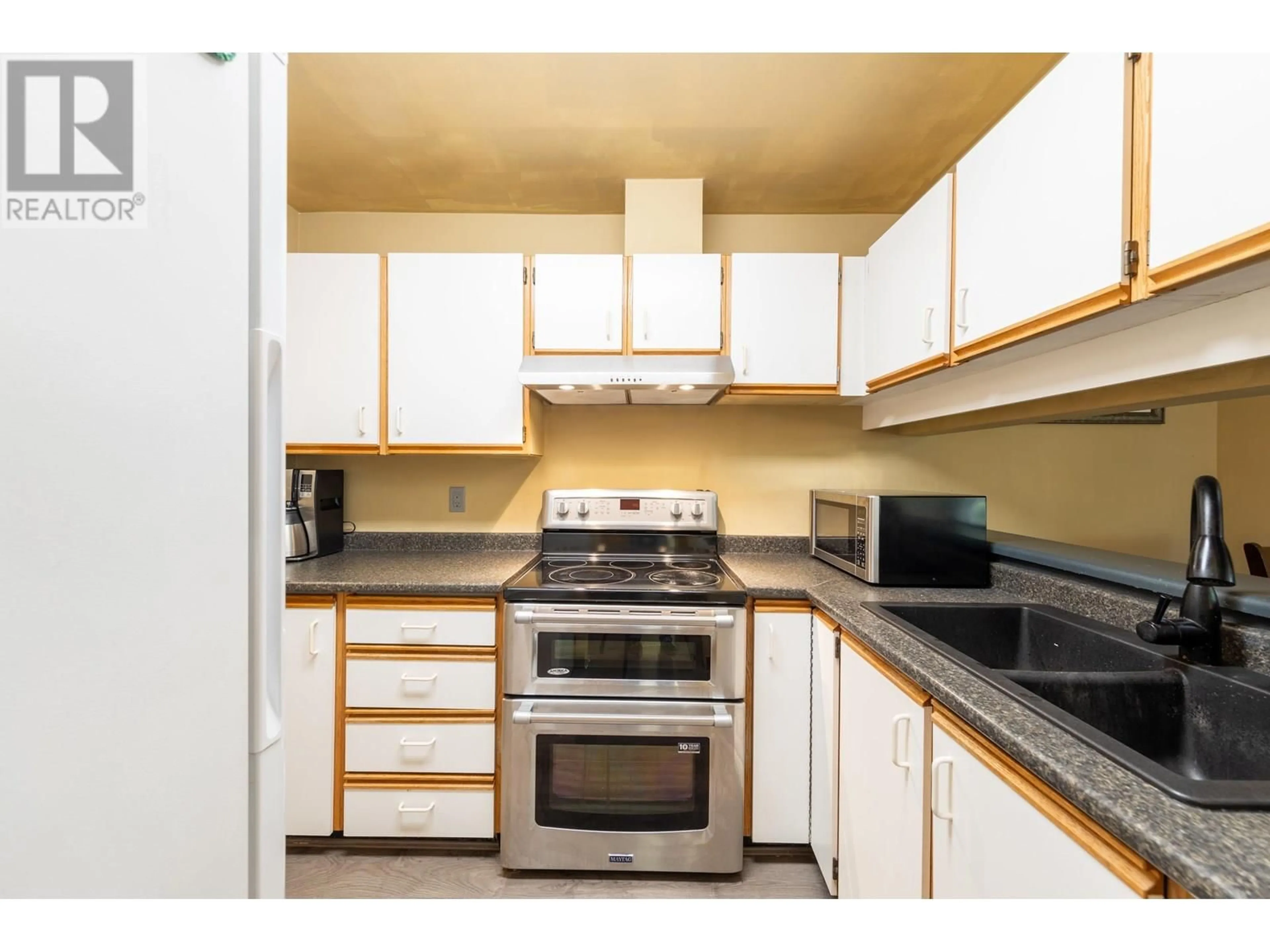Standard kitchen, wood/laminate floor for 108 - 1190 PACIFIC STREET, Coquitlam British Columbia V3B6Z2