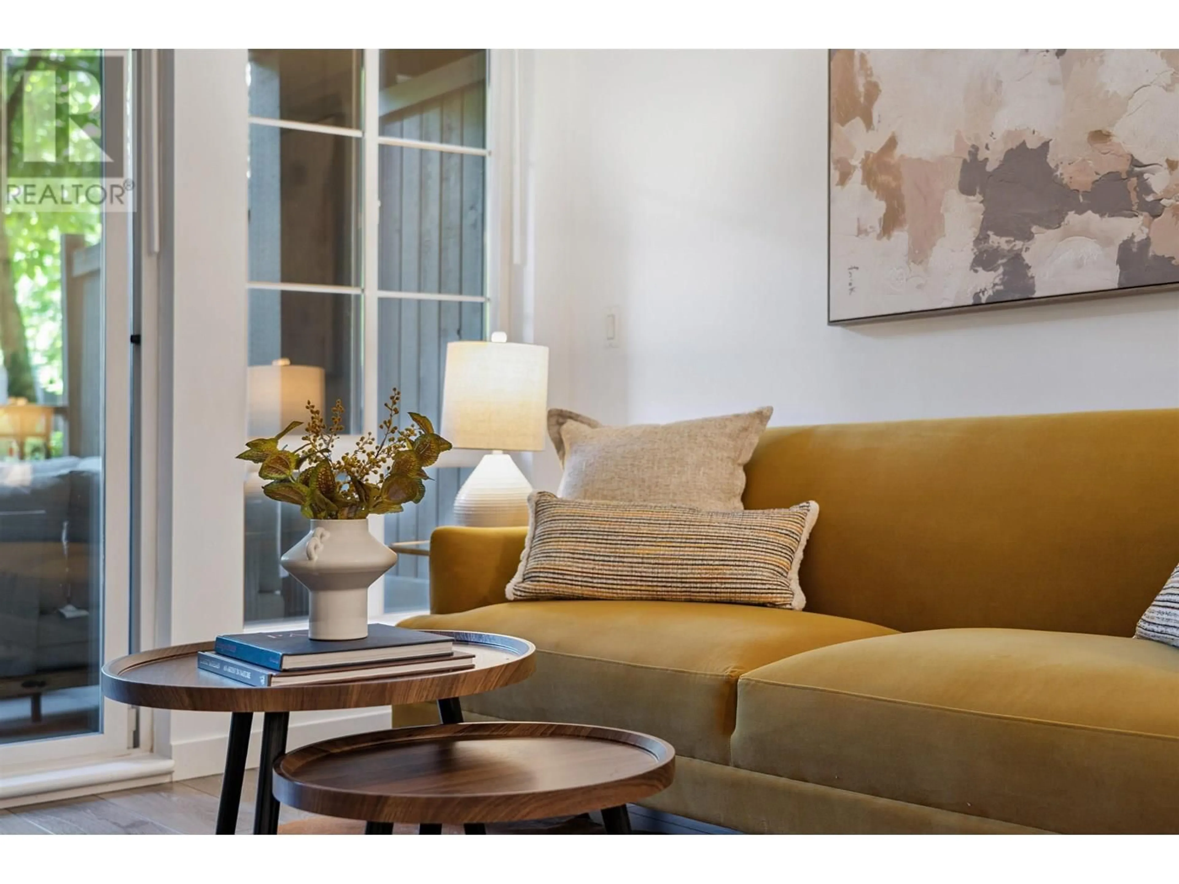 Living room with furniture, wood/laminate floor for 115 - 9283 GOVERNMENT STREET, Burnaby British Columbia V3N0A5
